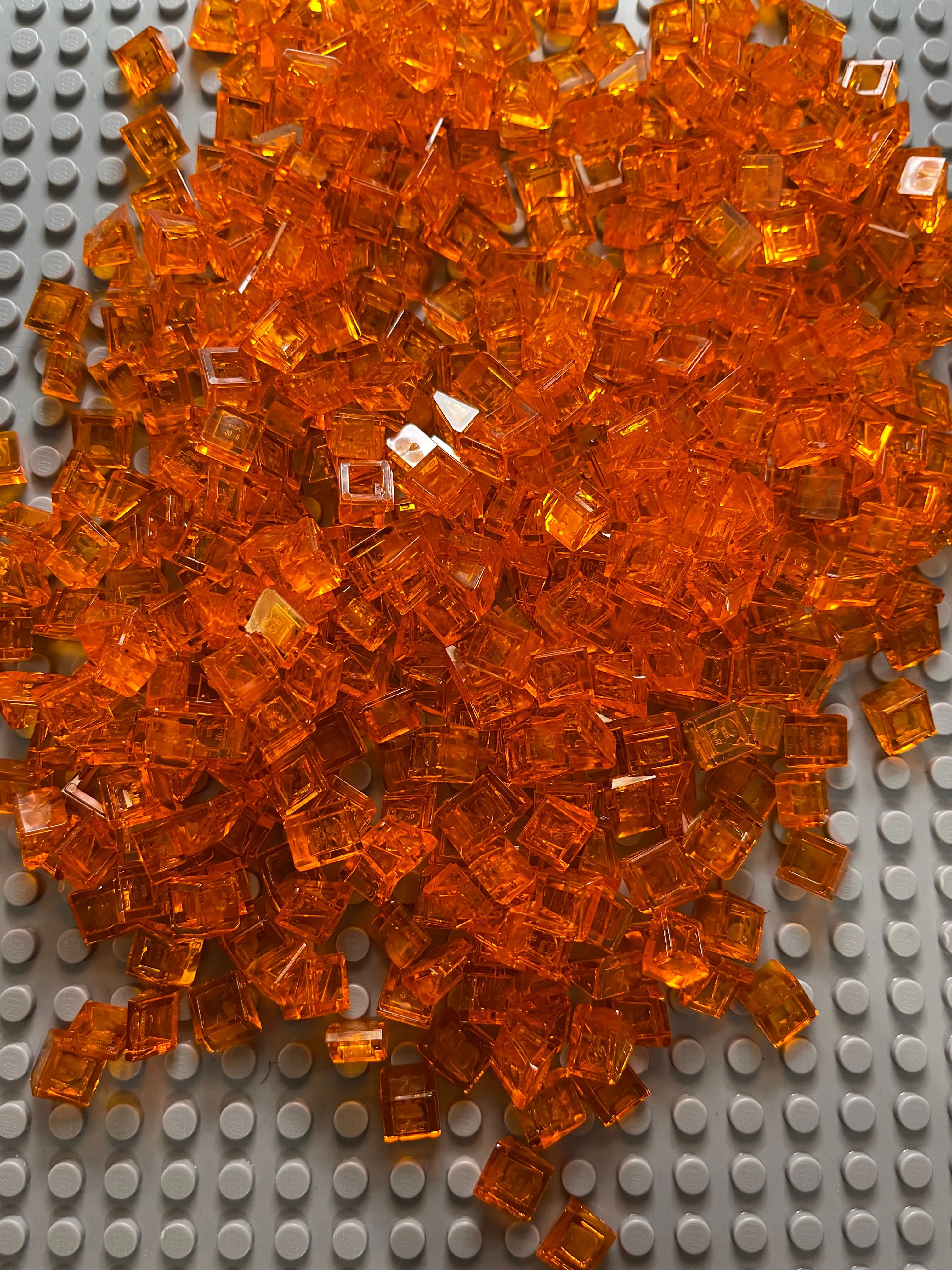 Product image for LEGO Slope 30 1 x 1 x 2/3 - Transparent orange Lot of 30