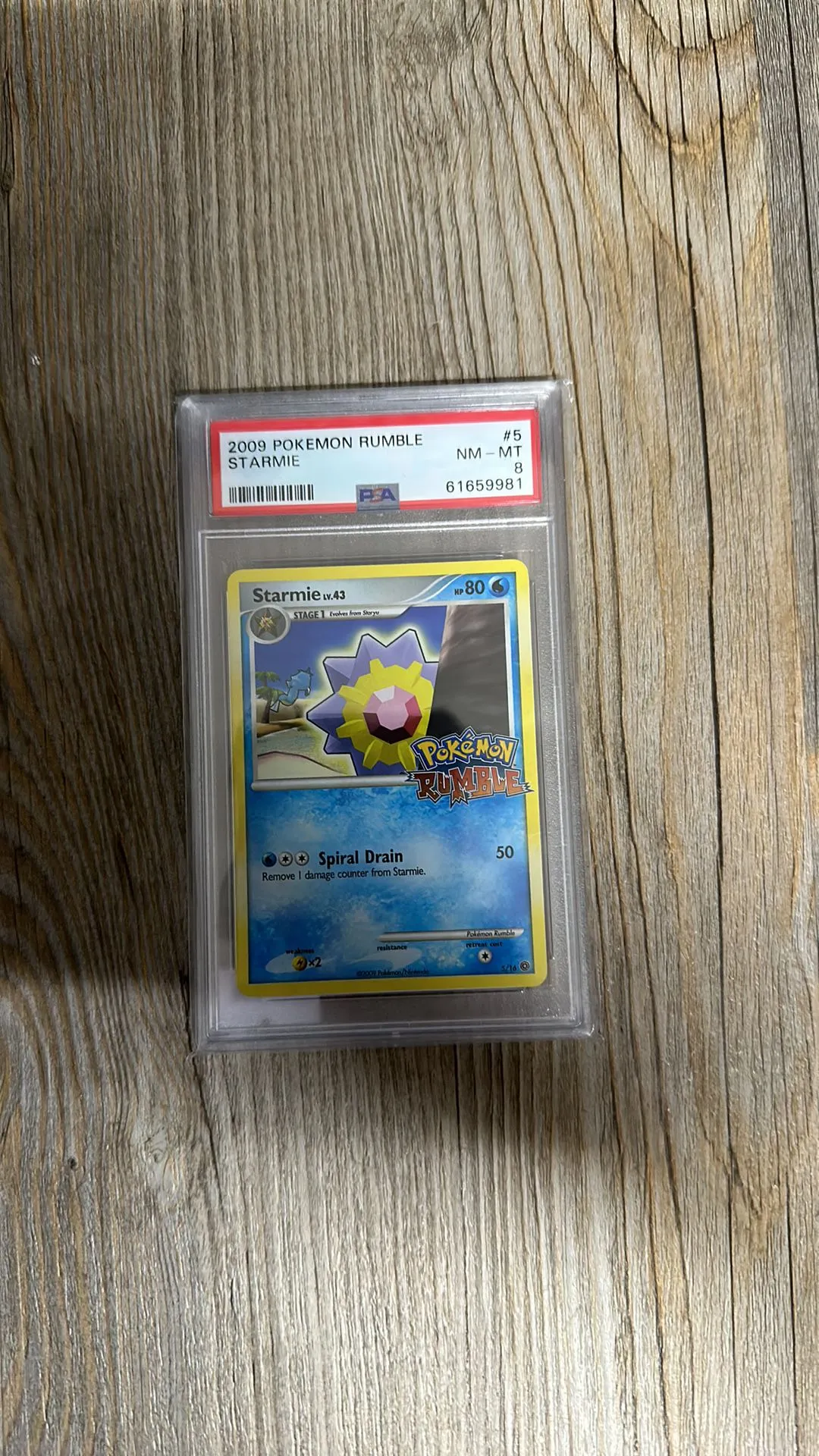 Product image for 2009 Pokemon Rumble Starmie  PSA NM-MT 8