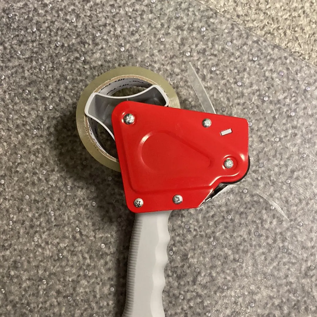 Product image for Tape dispenser with a roll of tape
