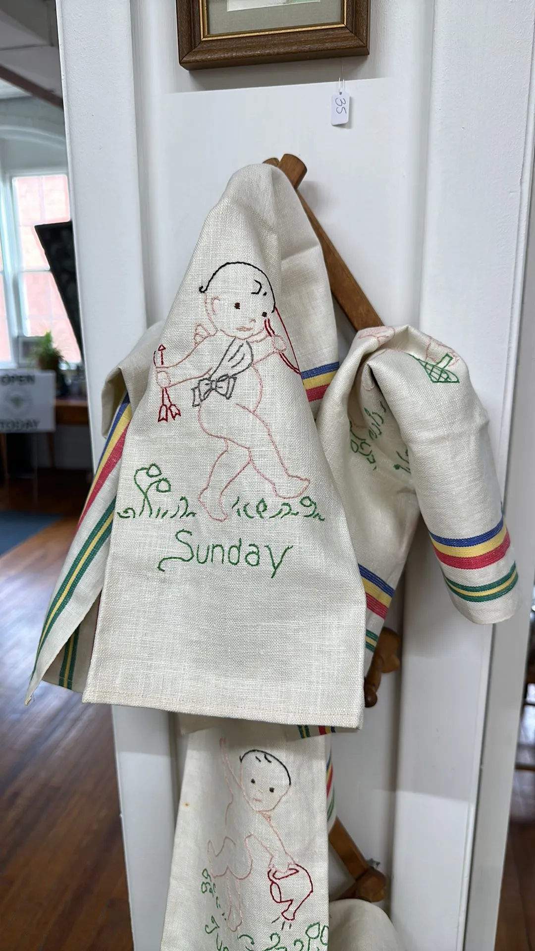 Product image for Days of the week embroidered hand towels with cherubs