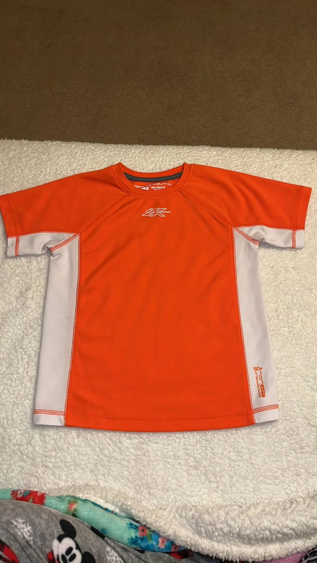 Product image for 112. ZeroXPosur orange rashguard, size 7