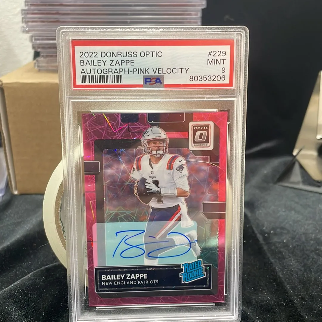 Product image for 2022 Panini Donruss Optic Bailey Zappe 229 Autograph-Pink Velocity PSA MINT 9