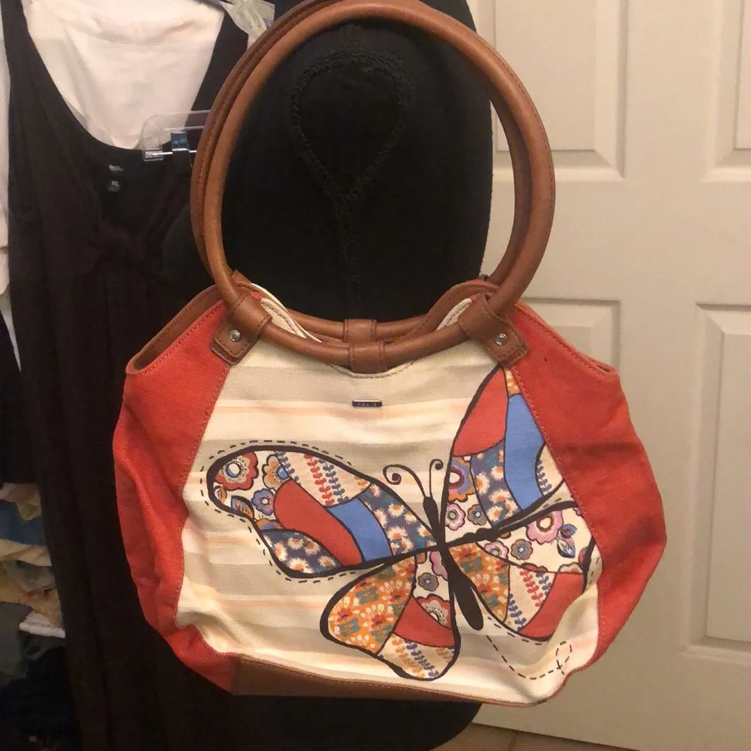 Product image for 63. Butterfly relic purse