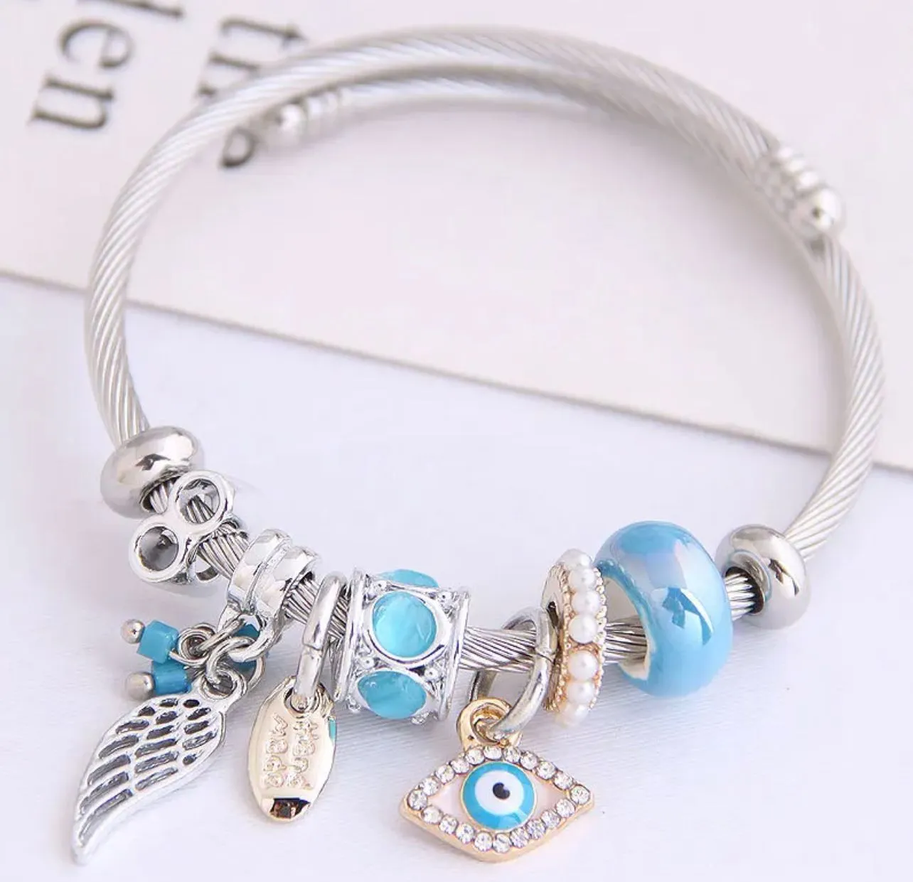 Product image for Stainless Steel Birthstone Pearl/Luxury Wing Evil Eye Bracelet/ Adjustable