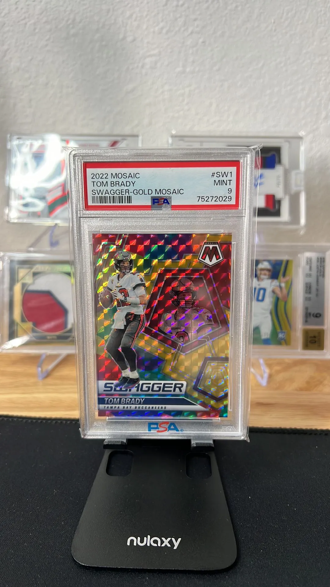 Product image for 2022 Panini Mosaic Swagger Tom Brady SW1 Swagger-Gold Mosaic PSA MINT 9