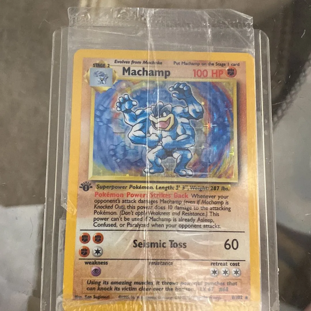 machamp first edition card Dark (27) (1st Non-Holo) - Team Rocket (TR) Machamp (Base Set Shadowless) (8/102) Value of this sealed Machamp?