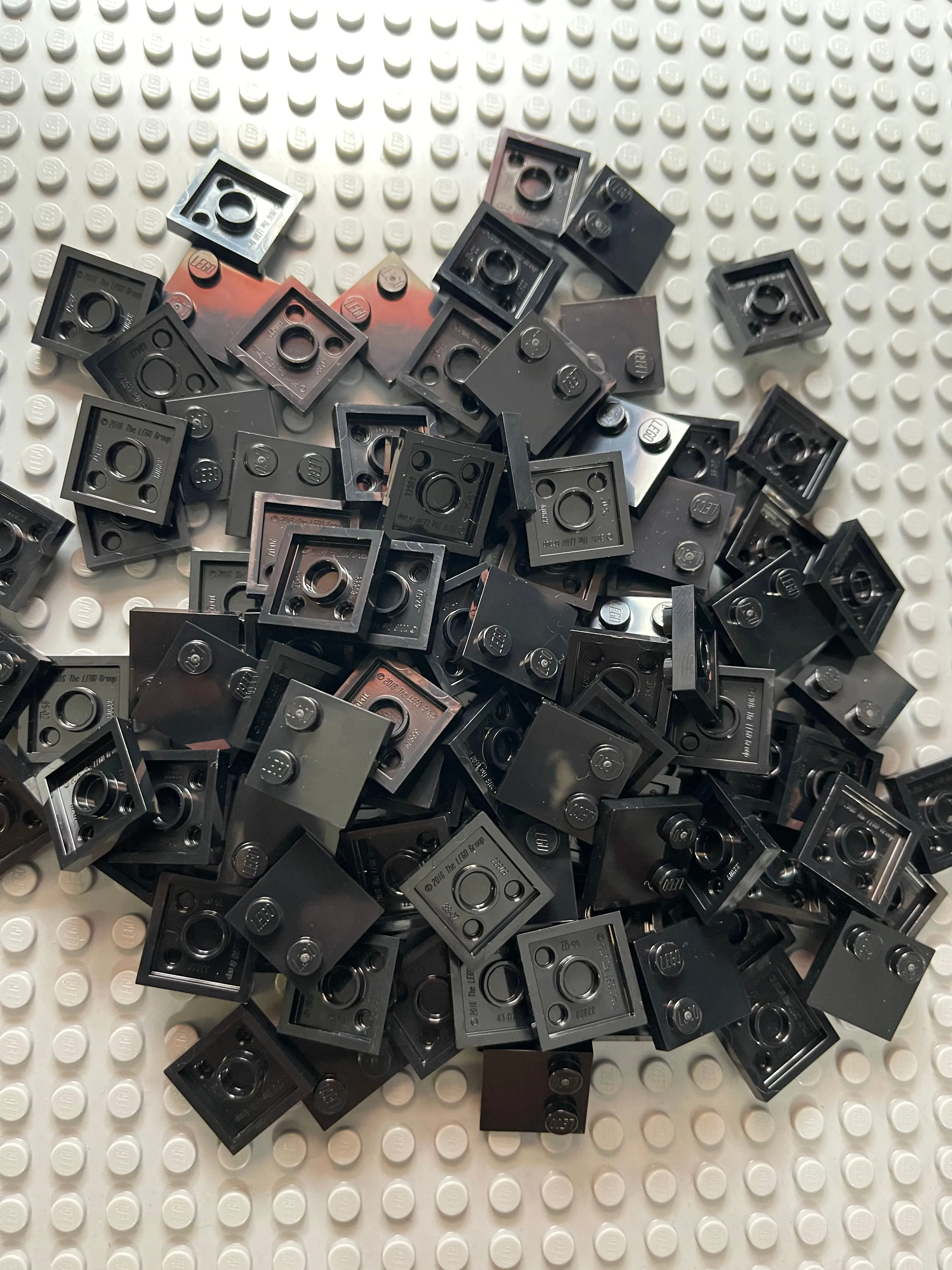 Product image for Lego Tile, Modified 2 x 2 with Studs on Edge, Black Lot of 20