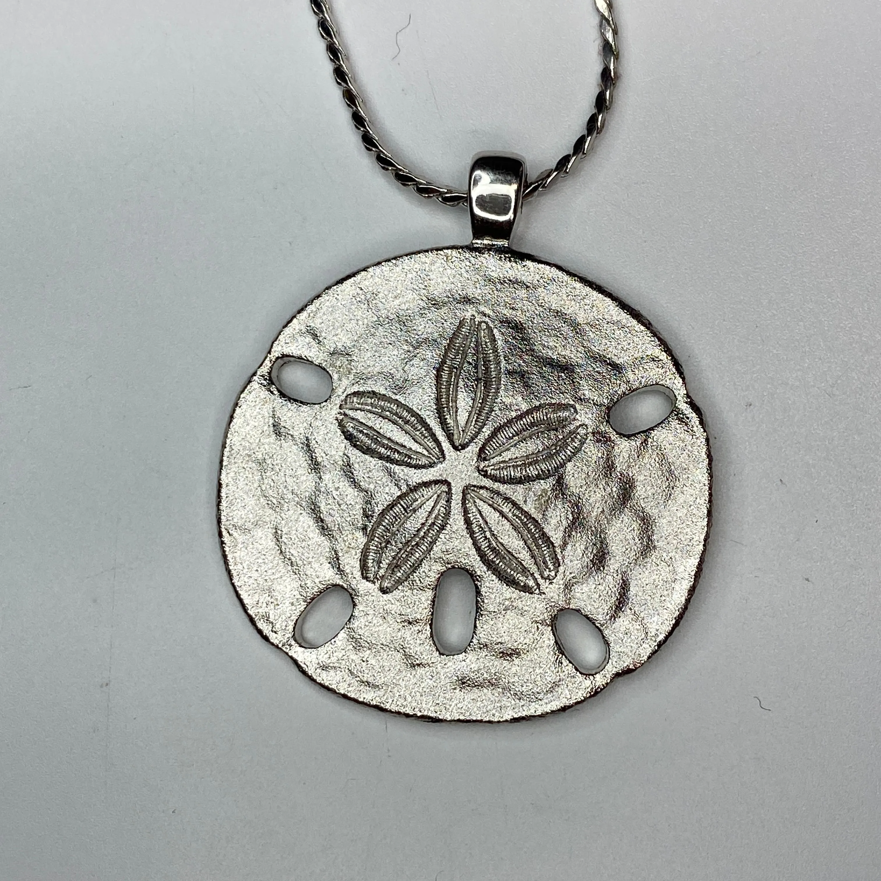 Product image for A543 Vintage Monet Silver Tone Sand Dollar Necklace 30 Inch Chain