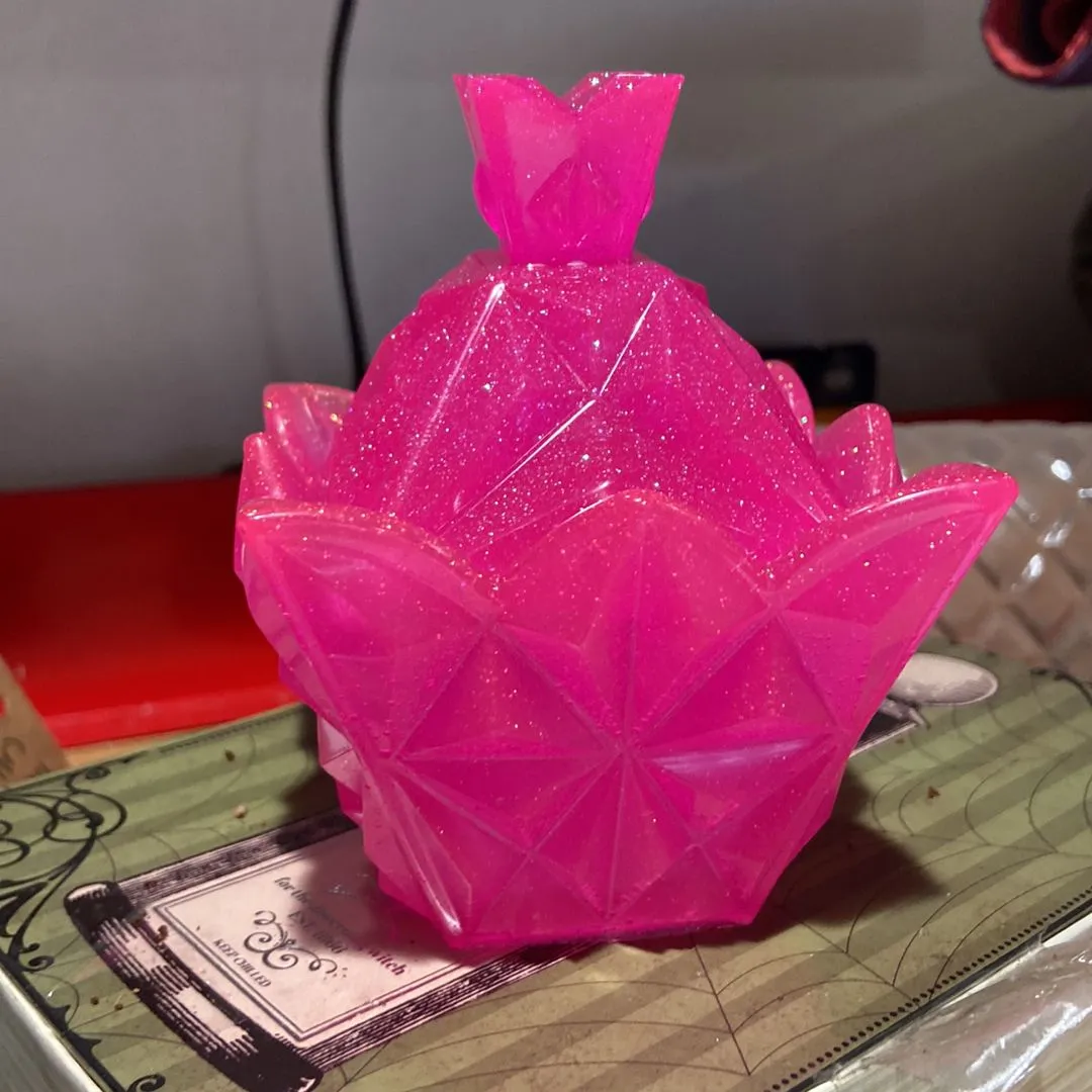 Product image for Epoxy resin pink glitter glow in the dark odd shaped container