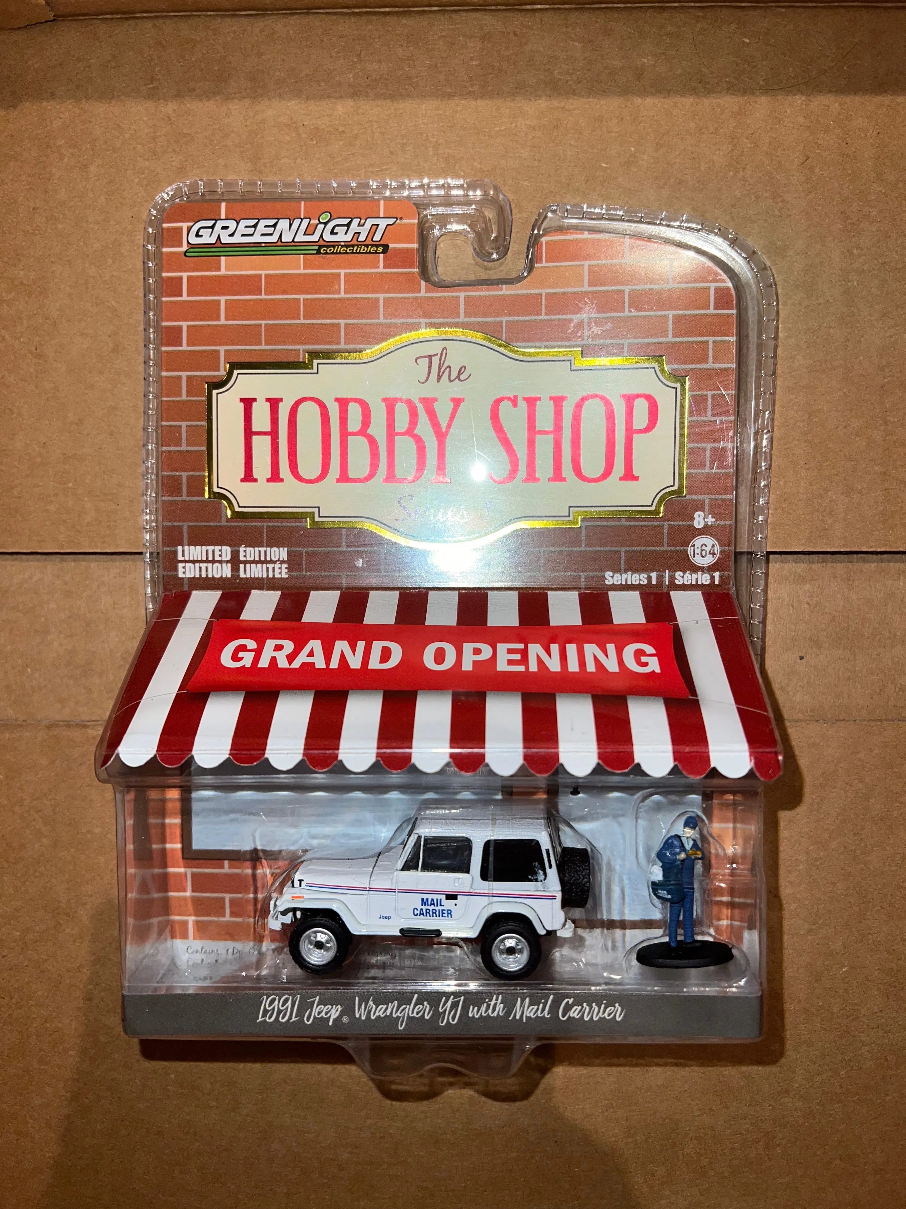 Product image for Greenlight 1991 JEEP WRANGLER White USPS w/Mail Carrier HOBBY SHOP Series 1