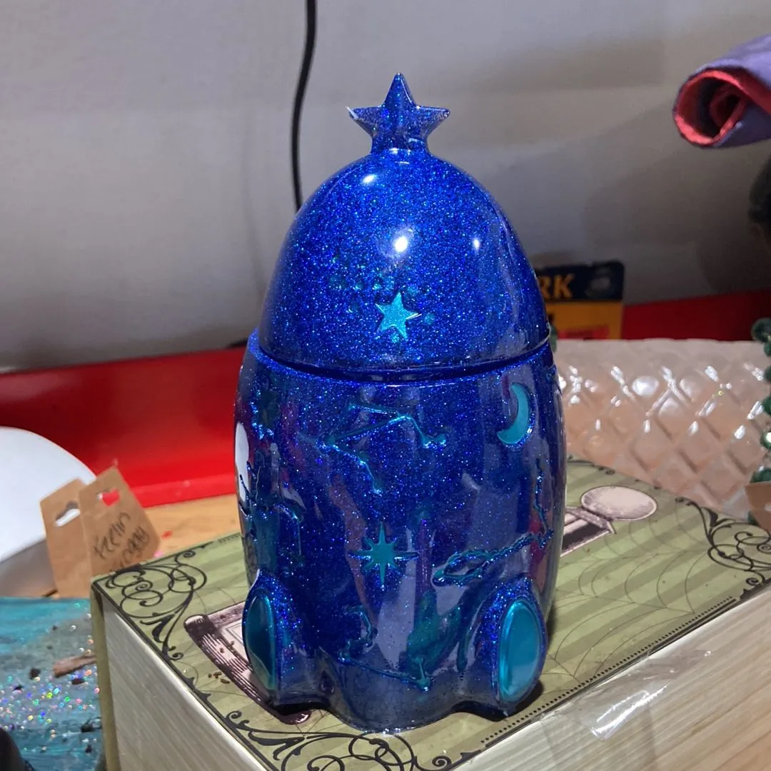 Product image for Epoxy resin blue glitter spaceship container