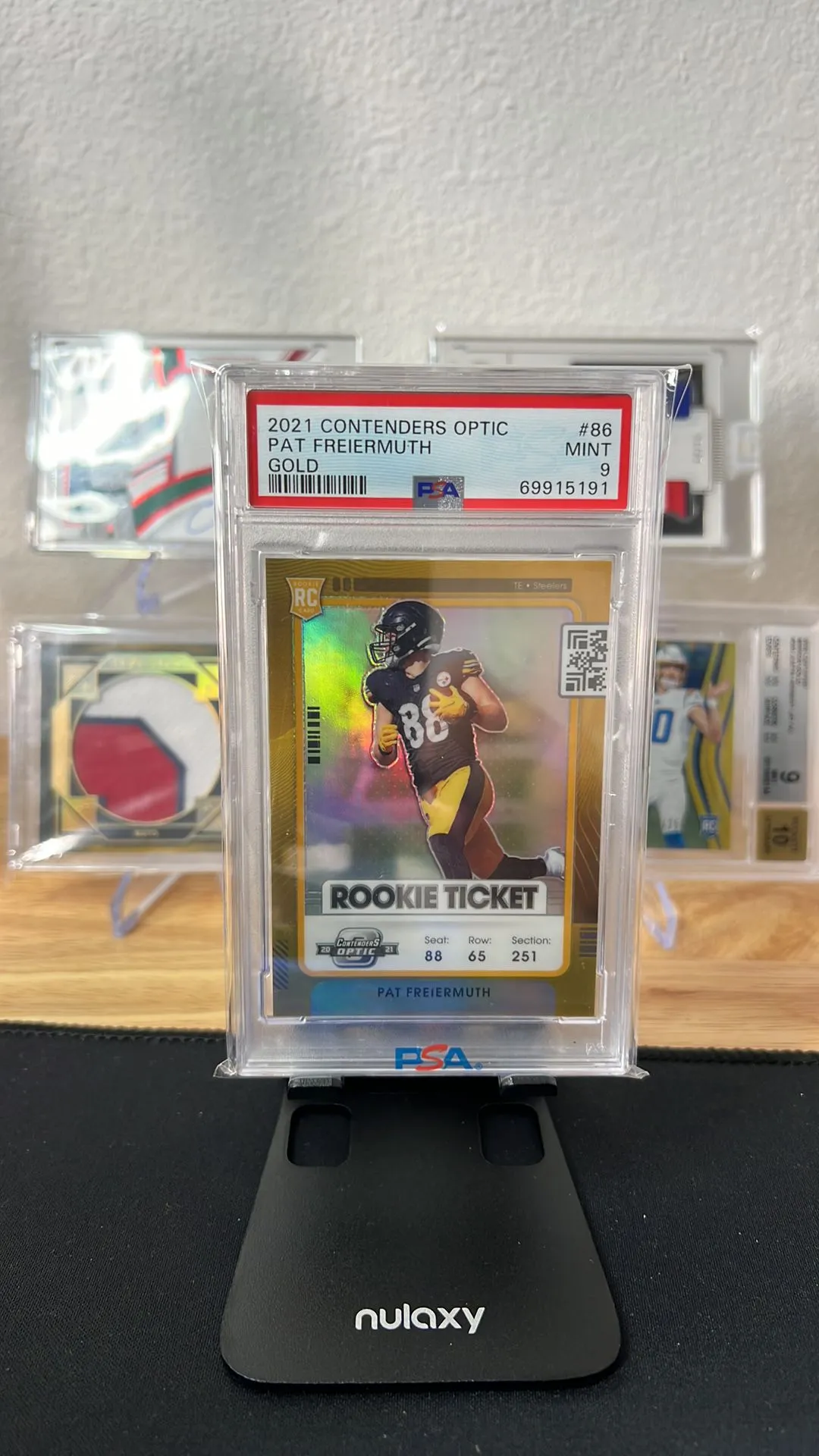 Product image for 2021 Panini Contenders Optic Pat Freiermuth 86 Gold PSA MINT 9