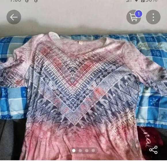 Product image for Tunic style with jagged him kind of tie-dye look to it blouse
