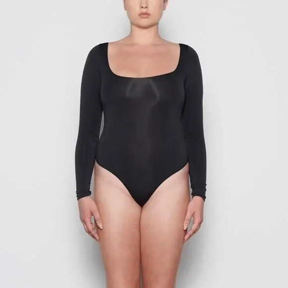Product image for New Skims Essential Scoop Neck Long Sleeve Black Thong Bodysuit