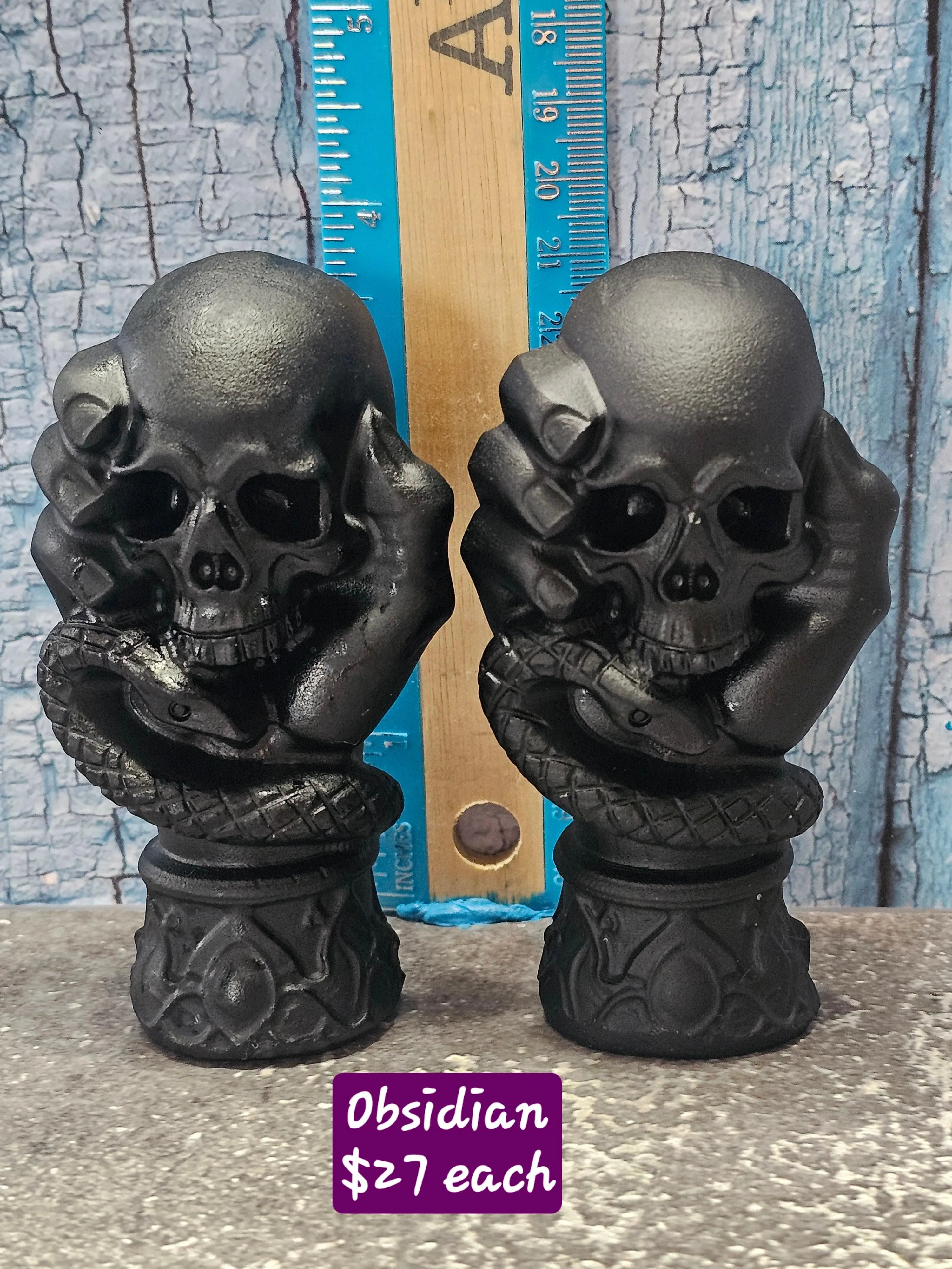 Obsidian Hand Holding Skull