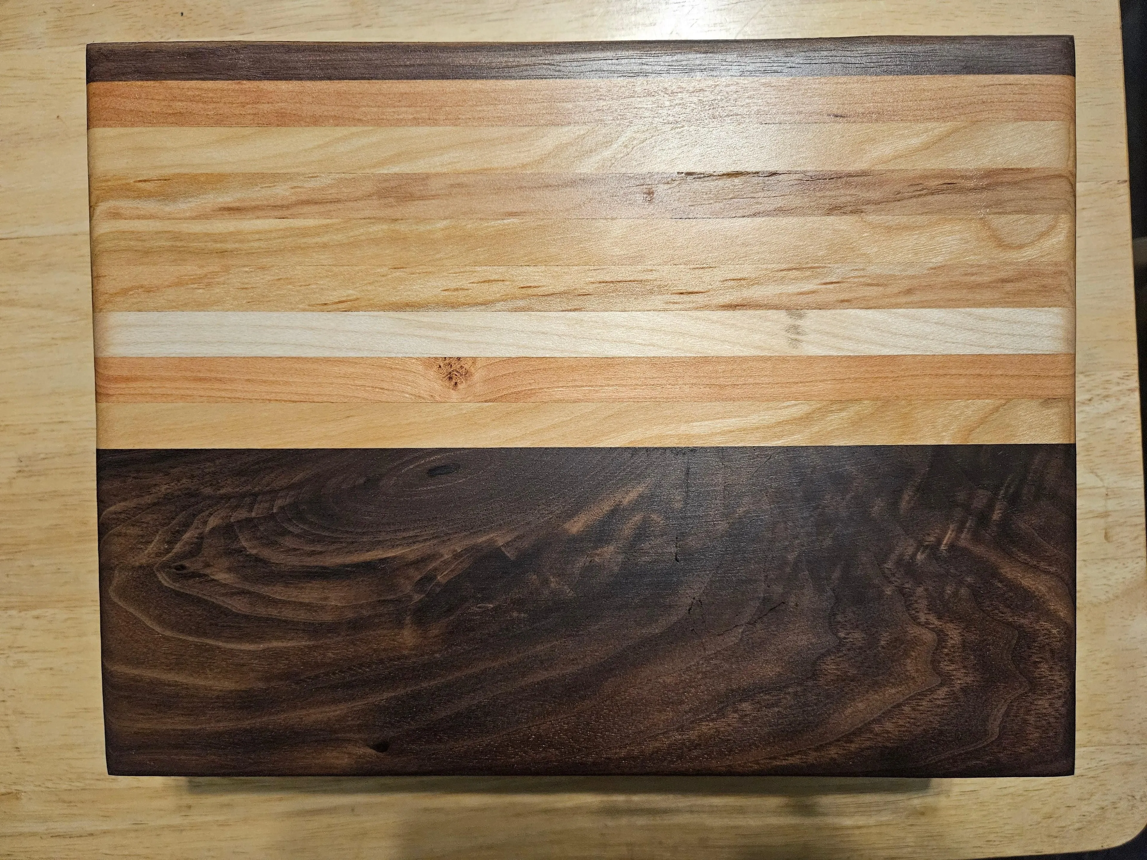 Cutting/Vegetable Board made w/ Walnut, cherry and Maple with finger grips 11" x 9"