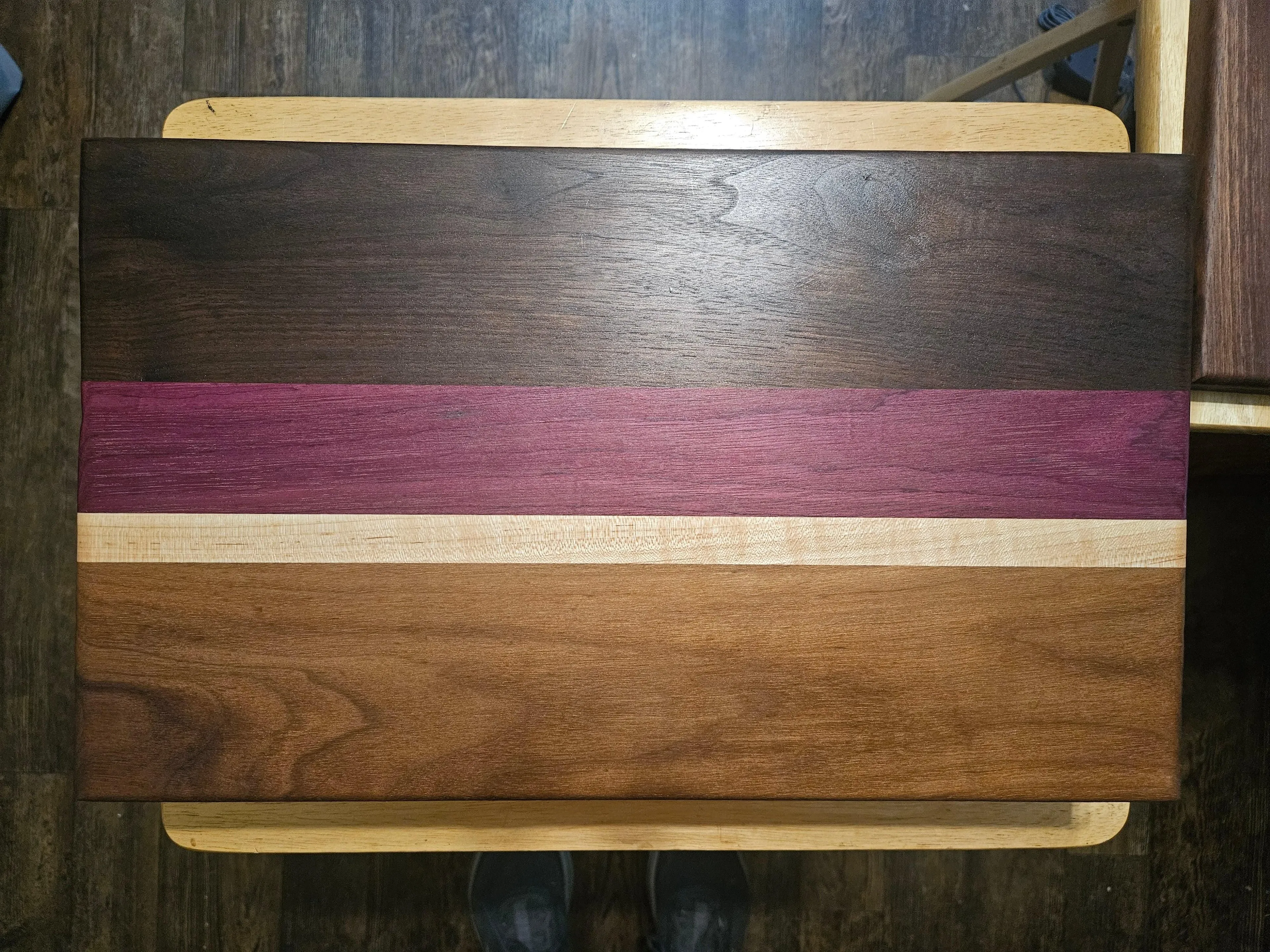 Large Walnut, maple and Purple Heart Cutting Board with finger grips