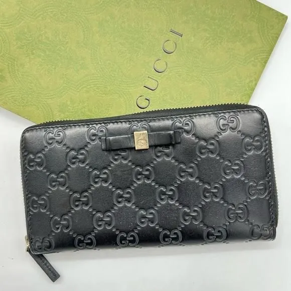 Product image for 010. GUCCI Bow Zip Around Guccissima Leather Long Wallet Black Zippy