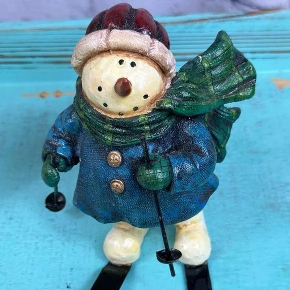 Product image for SALE. Christmas Around the World Vintage Skiing Snowman