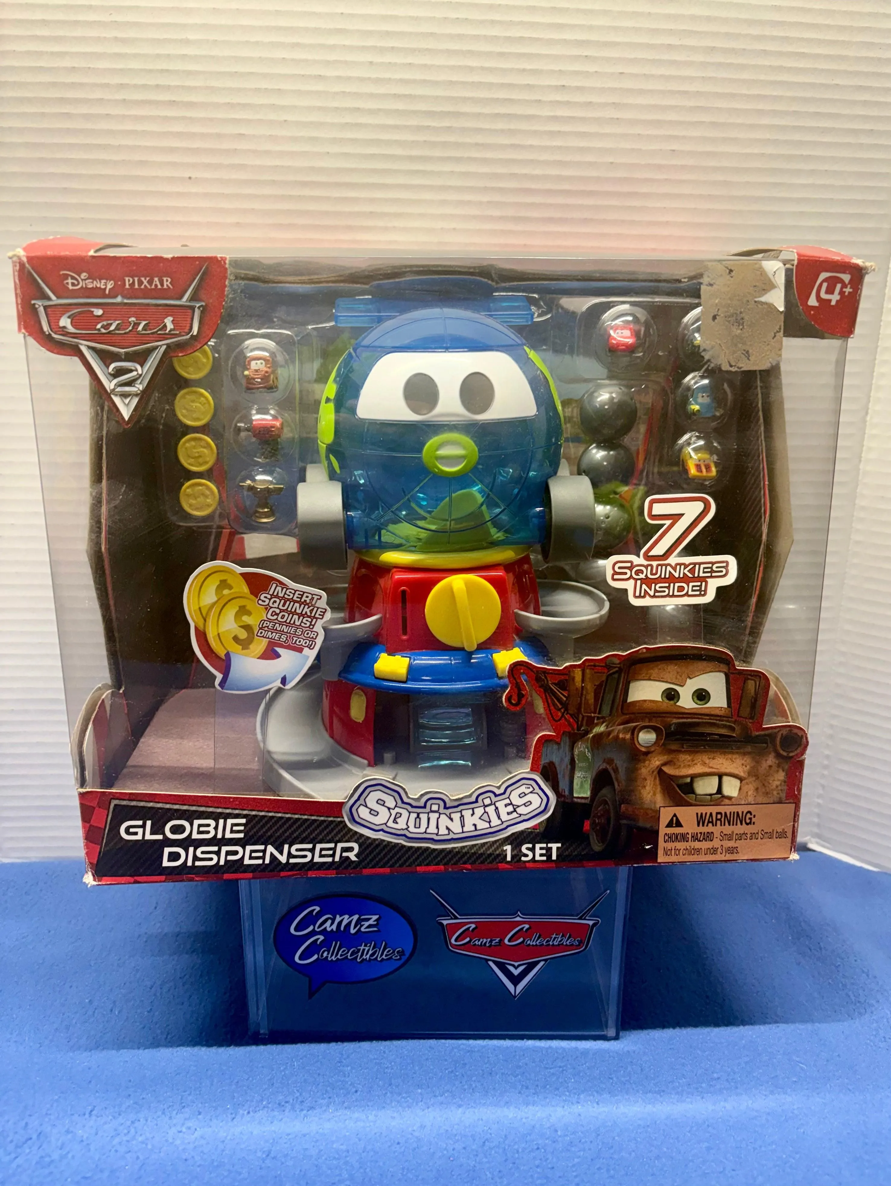 Disney Pixar Cars 2 Globie Dispenser Sealed with squinkies and coins