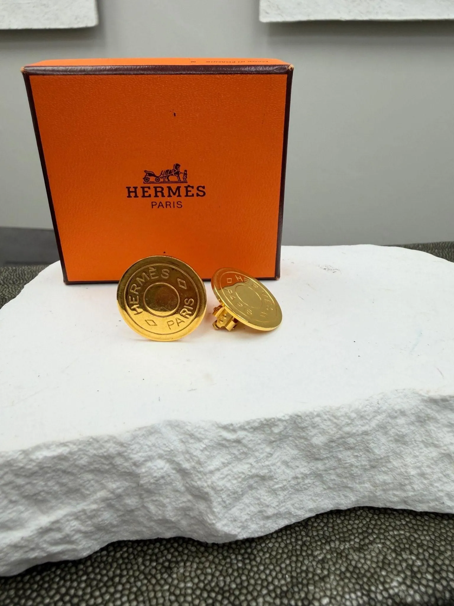 Hermes Gold Tone Coin Clip On Earrings