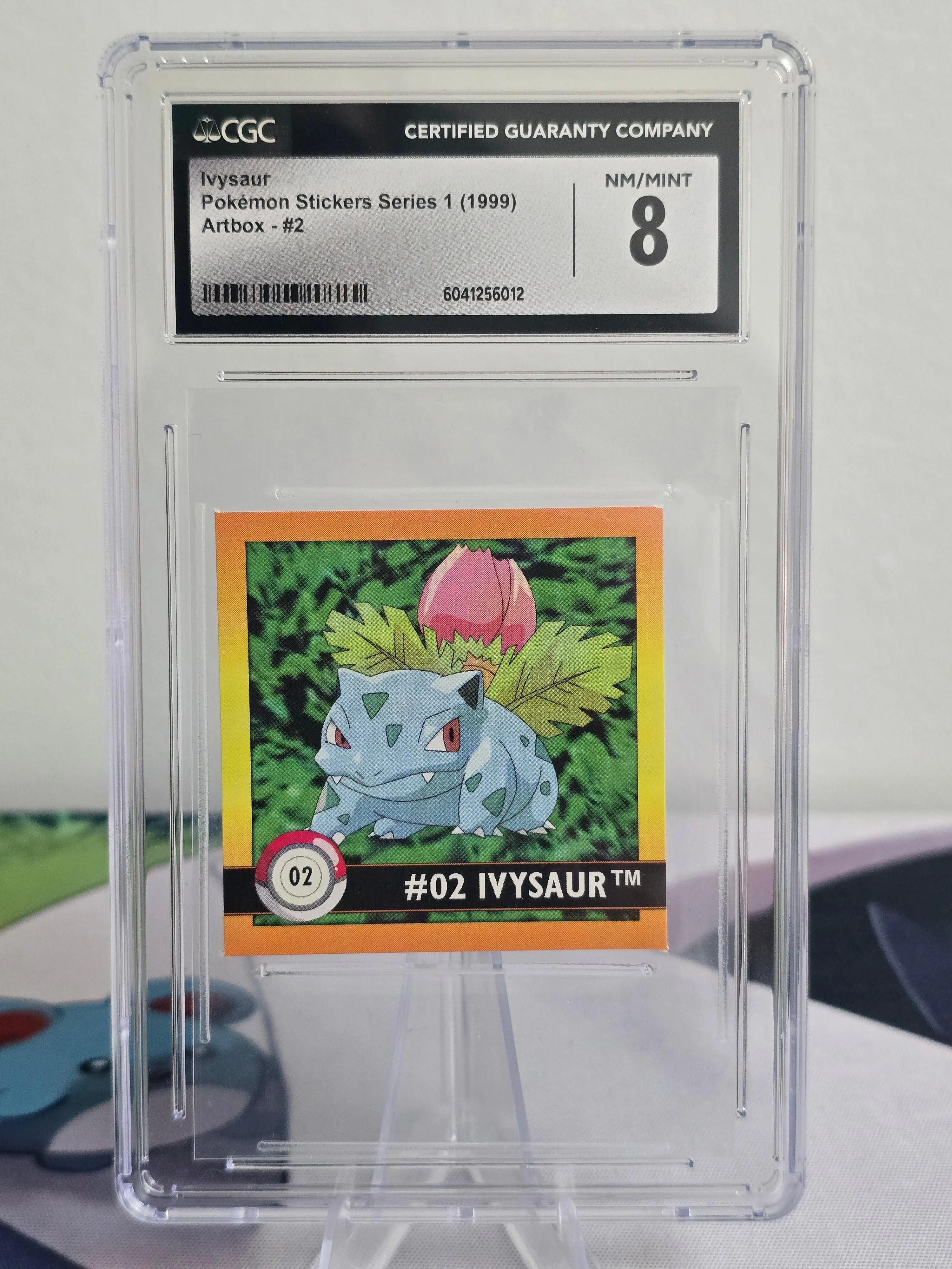 1999 Ivysaur #2 — Artbox Pokémon Stickers Series 1 — CGC 8 NM-Mint