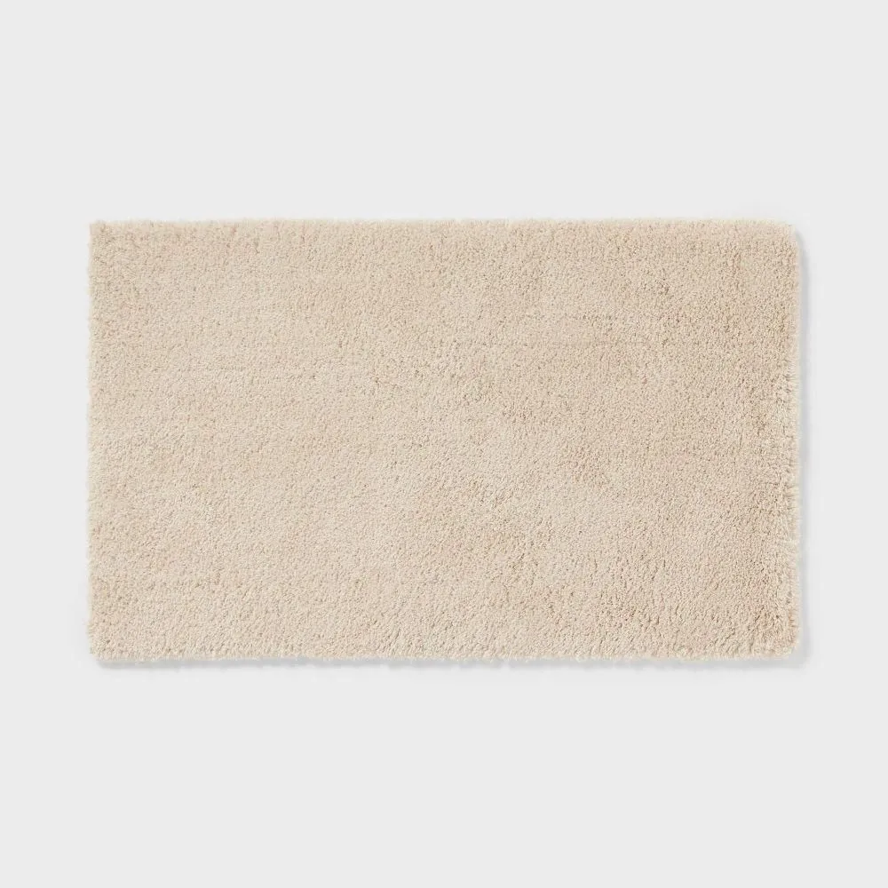 New without box - 24"x40" Spa Plush Bath Rug Almond - Threshold: Machine Washable Tufted Polyester