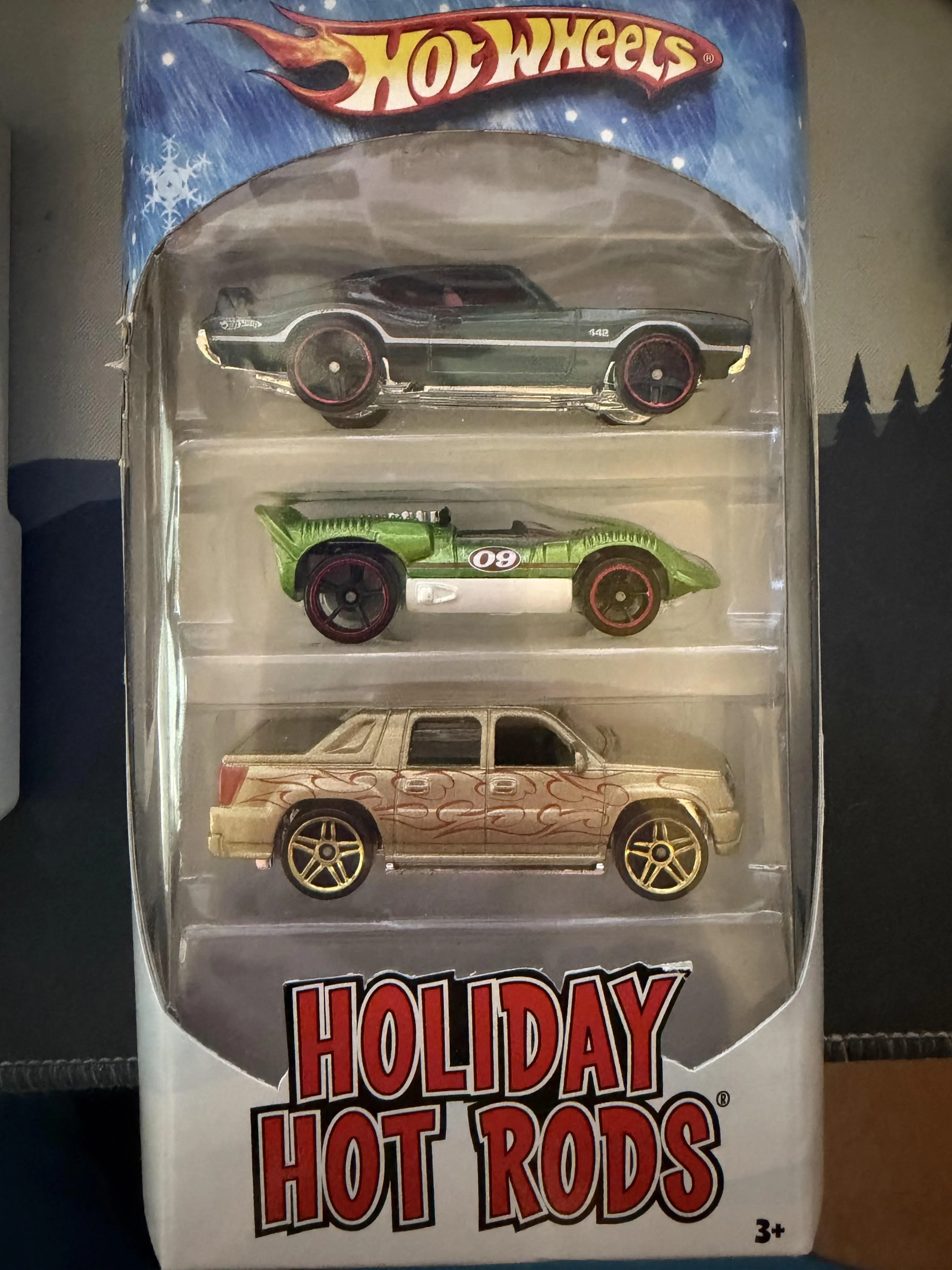 Hot Wheels Holiday Hot Rods 3 pack, Olds 442, Chaparral II, and Cadillac Escalade EXT Diecast Model Car