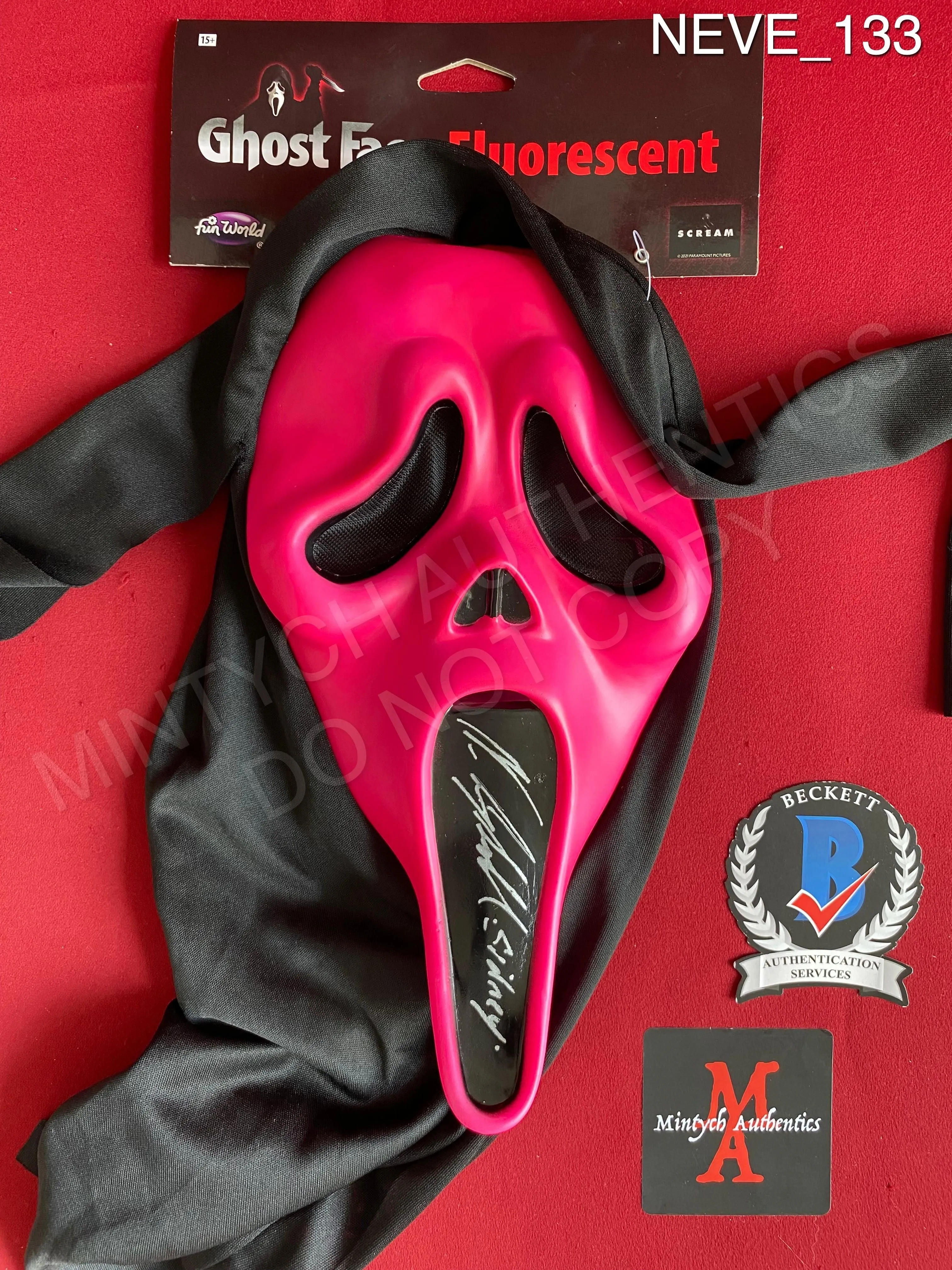 NEVE_133 - Ghost Face Pink Flourescent Mask Autographed By Neve Campbell