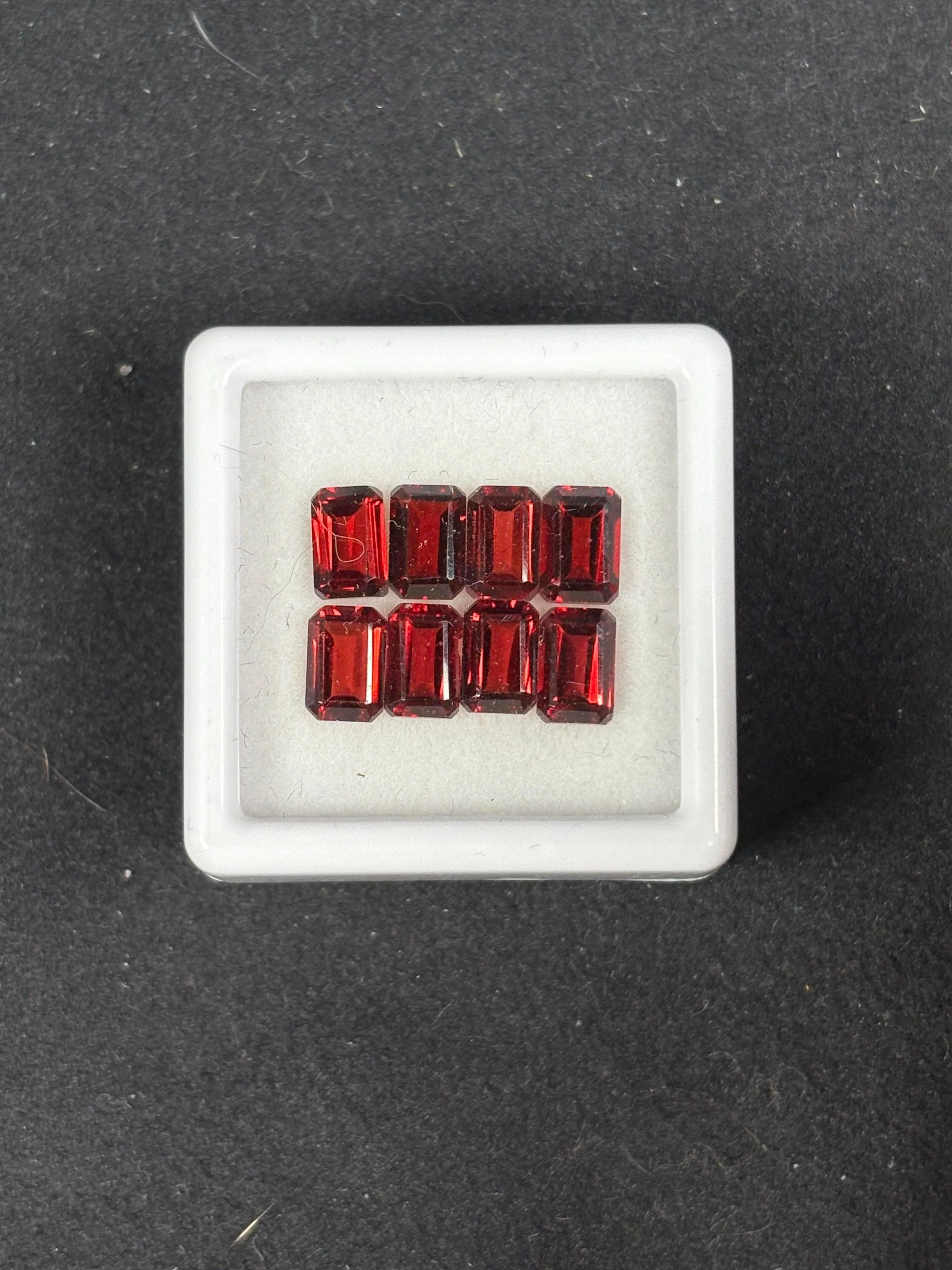 6.26ctw Red Garnet Lot from Mozambique, 8 stones, Emerald Cut, 6x4 mm