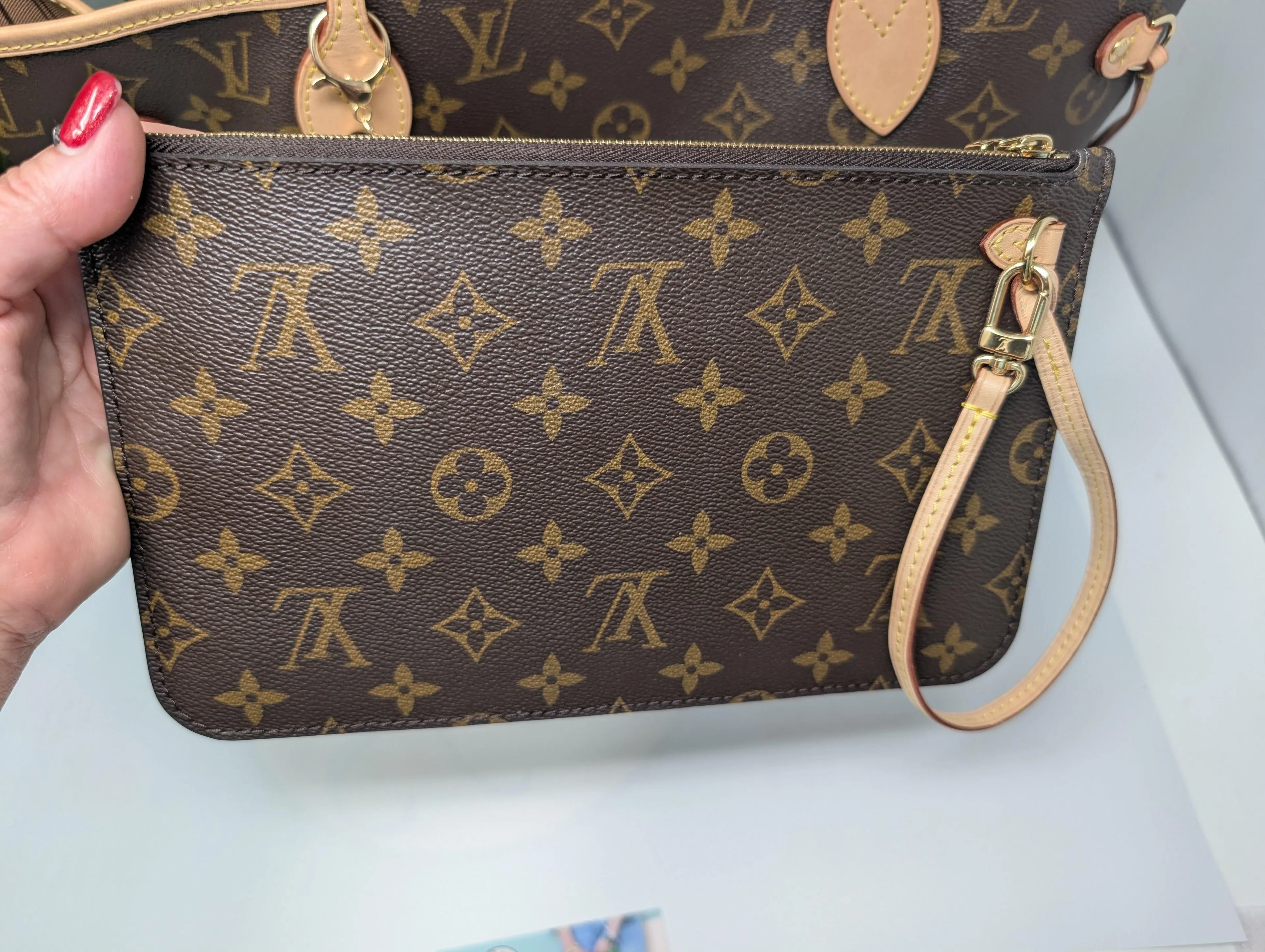 LOUISA VUITTON MONOGRAM POCHETTE WRISTLET, LIKE NEW