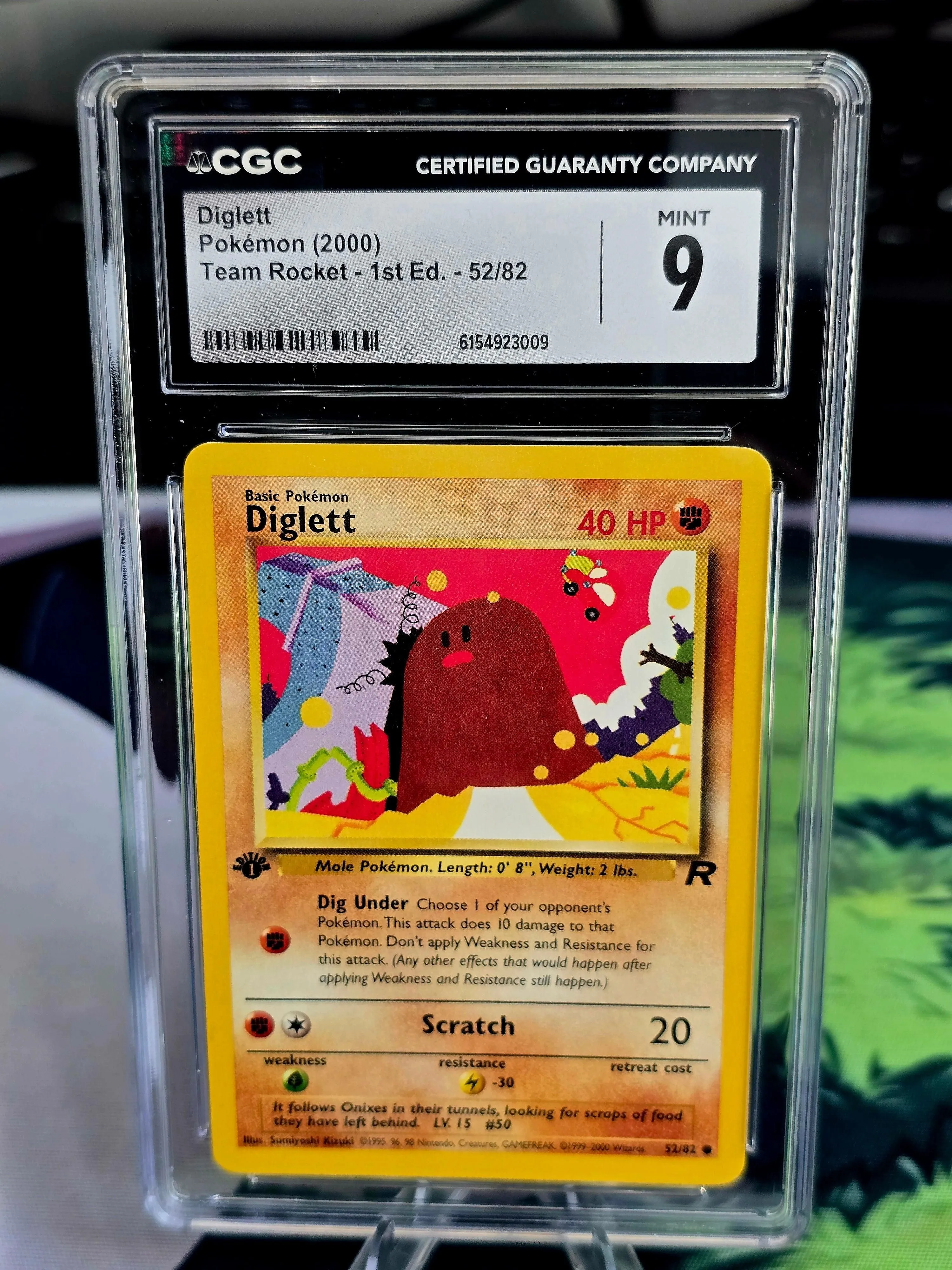 Diglett #52/82 (1st Edition) — Team Rocket (2000) — CGC 9 Mint