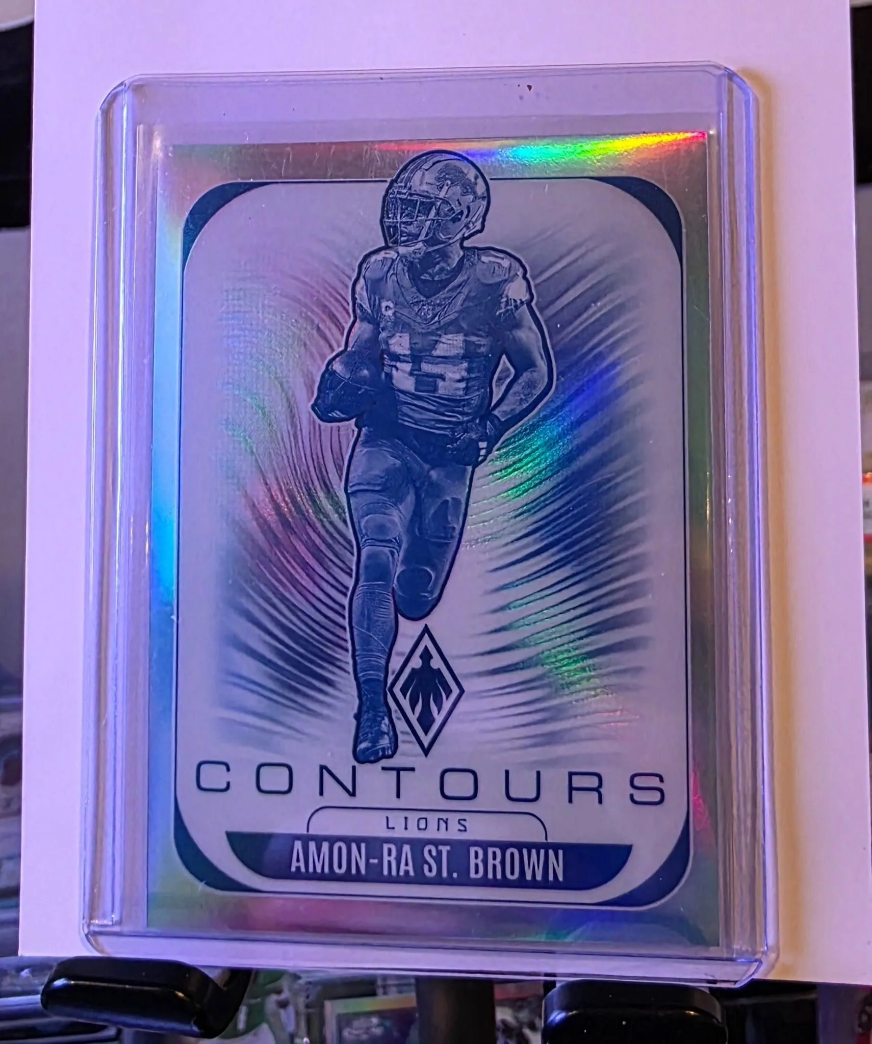 2025 Panini Phoenix Amon-Ra St. Brown Contours Refractor #11 Lions