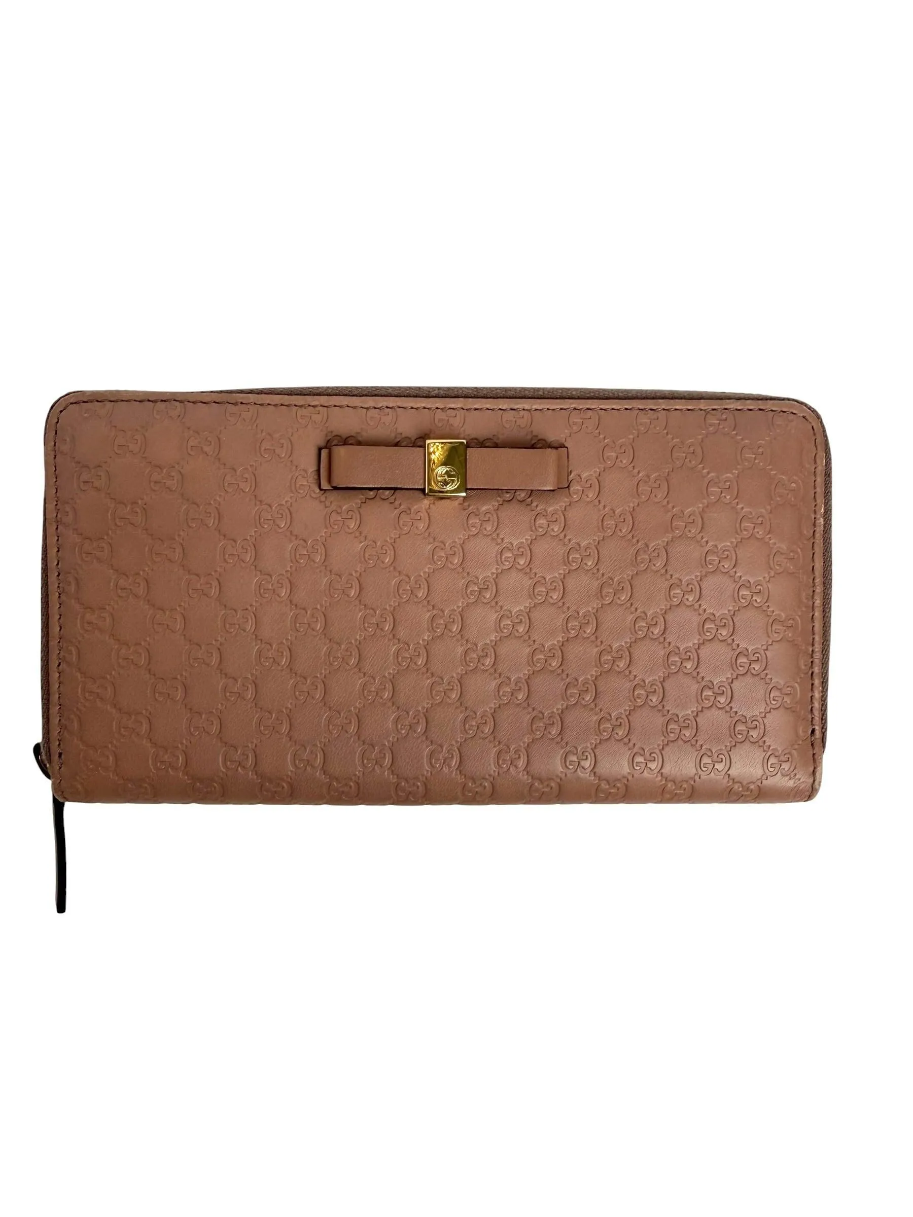 Gucci bow zip around embossed GG T8129