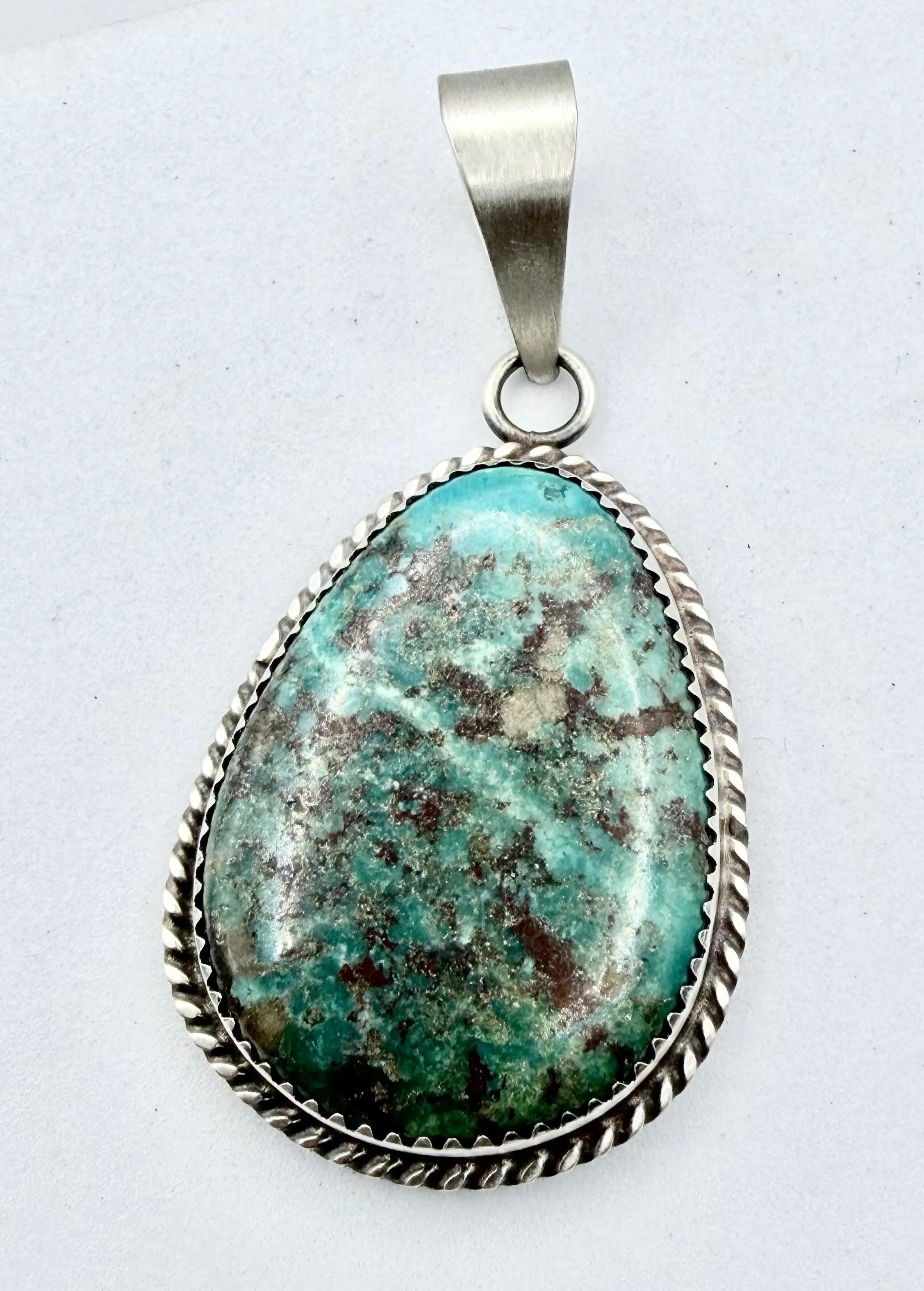 LONE MOUNTAIN TURQUOISE OVAL PENDANT BY LESLIE NEZ (PN 4)