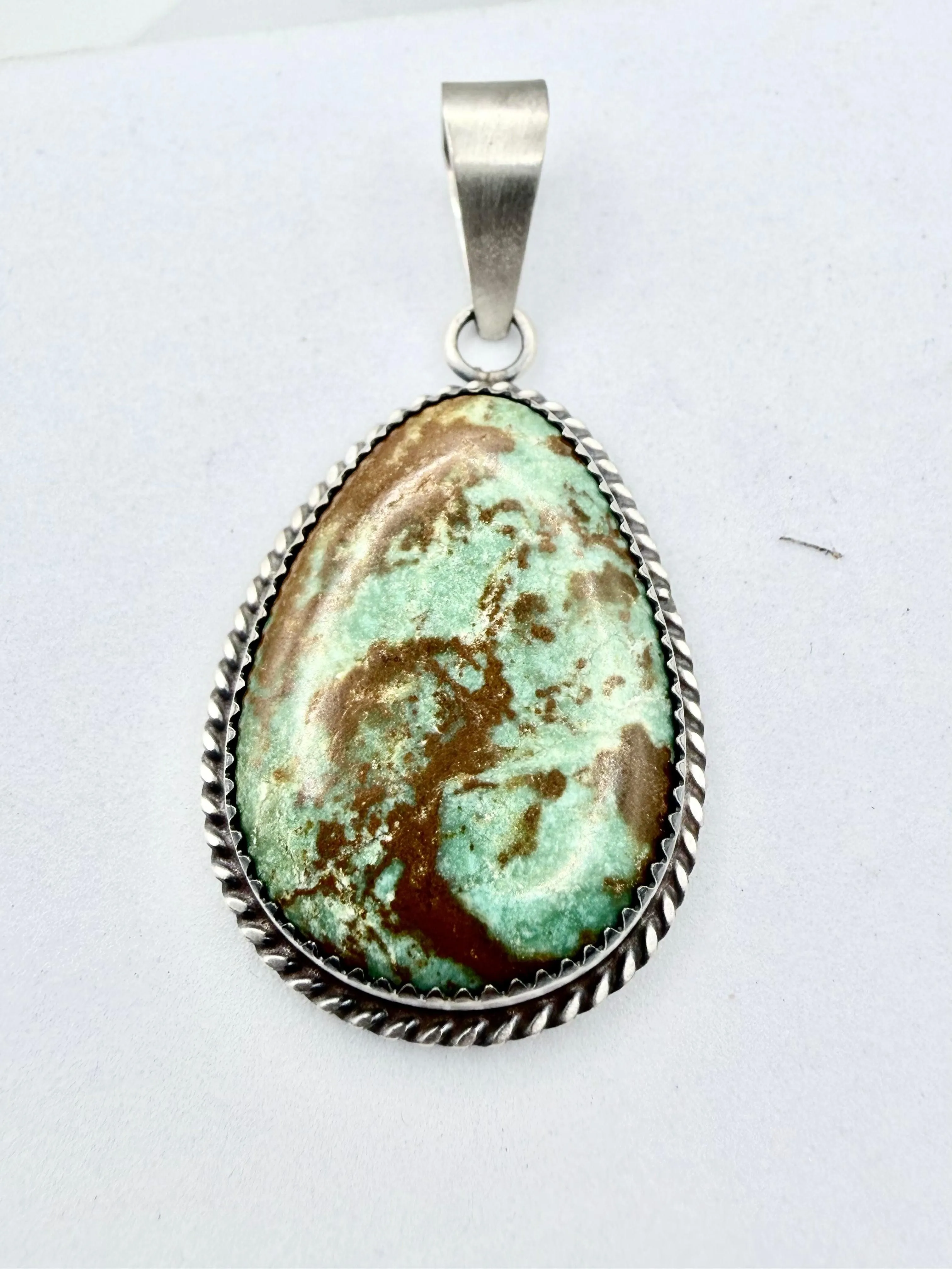 ROYSTON TURQUOISE OVAL NATIVE PENDANT BY LESLIE NEZ (PN 3)