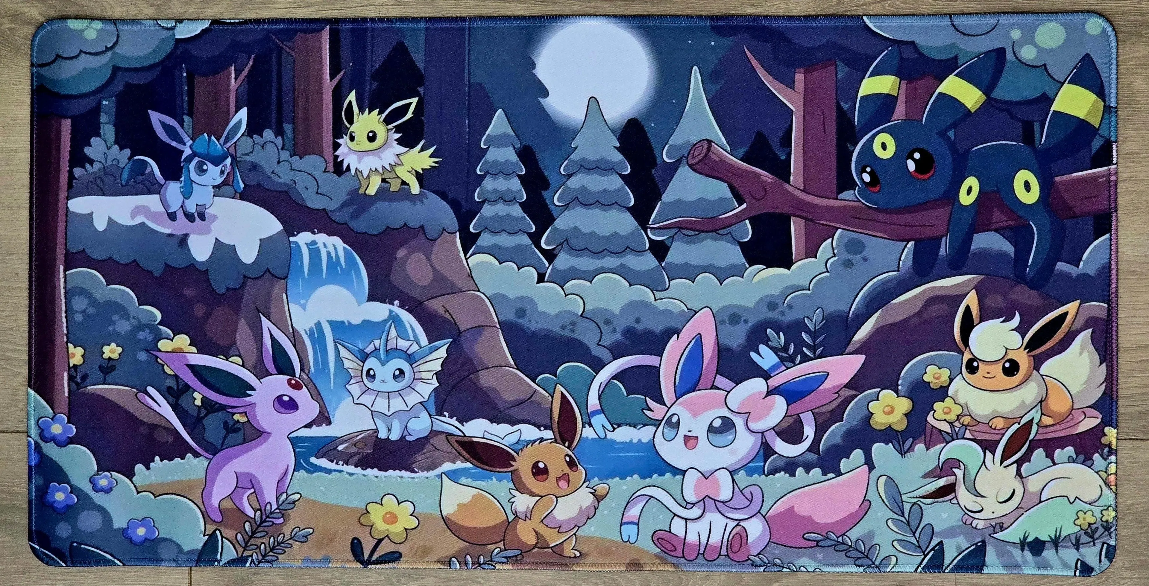 Eeveelution Moonlit Forest Playmat — Custom Stitched-Edge Play Mat (23.6" × 11.8")