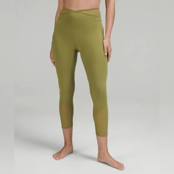 Product image for Lululemon Nulu and crisscross mesh stirrup leggings size 12 NWT