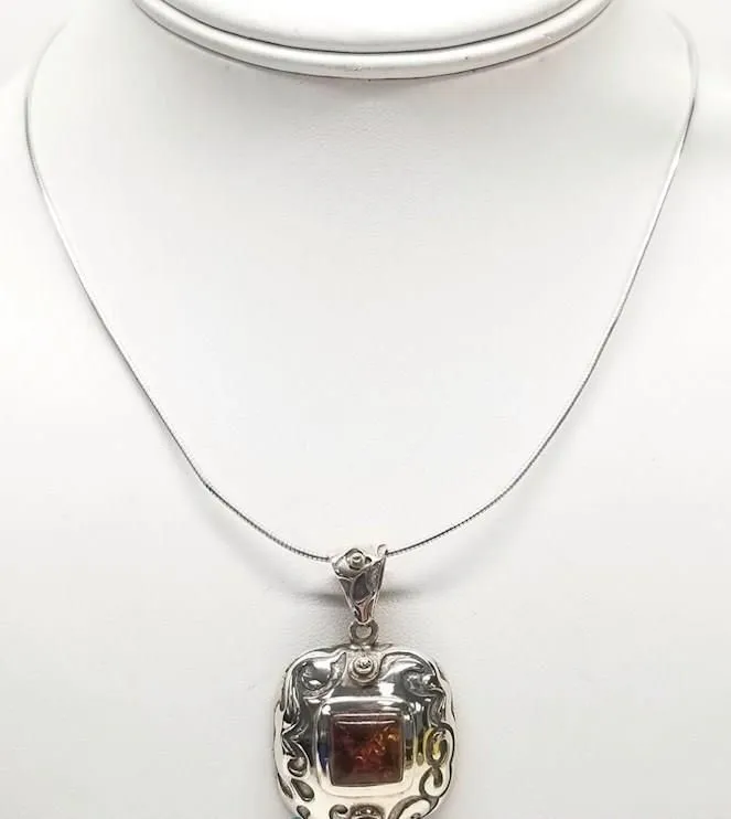 Product image for #063 Vintage Sterling Silver Amber Pendant on wire