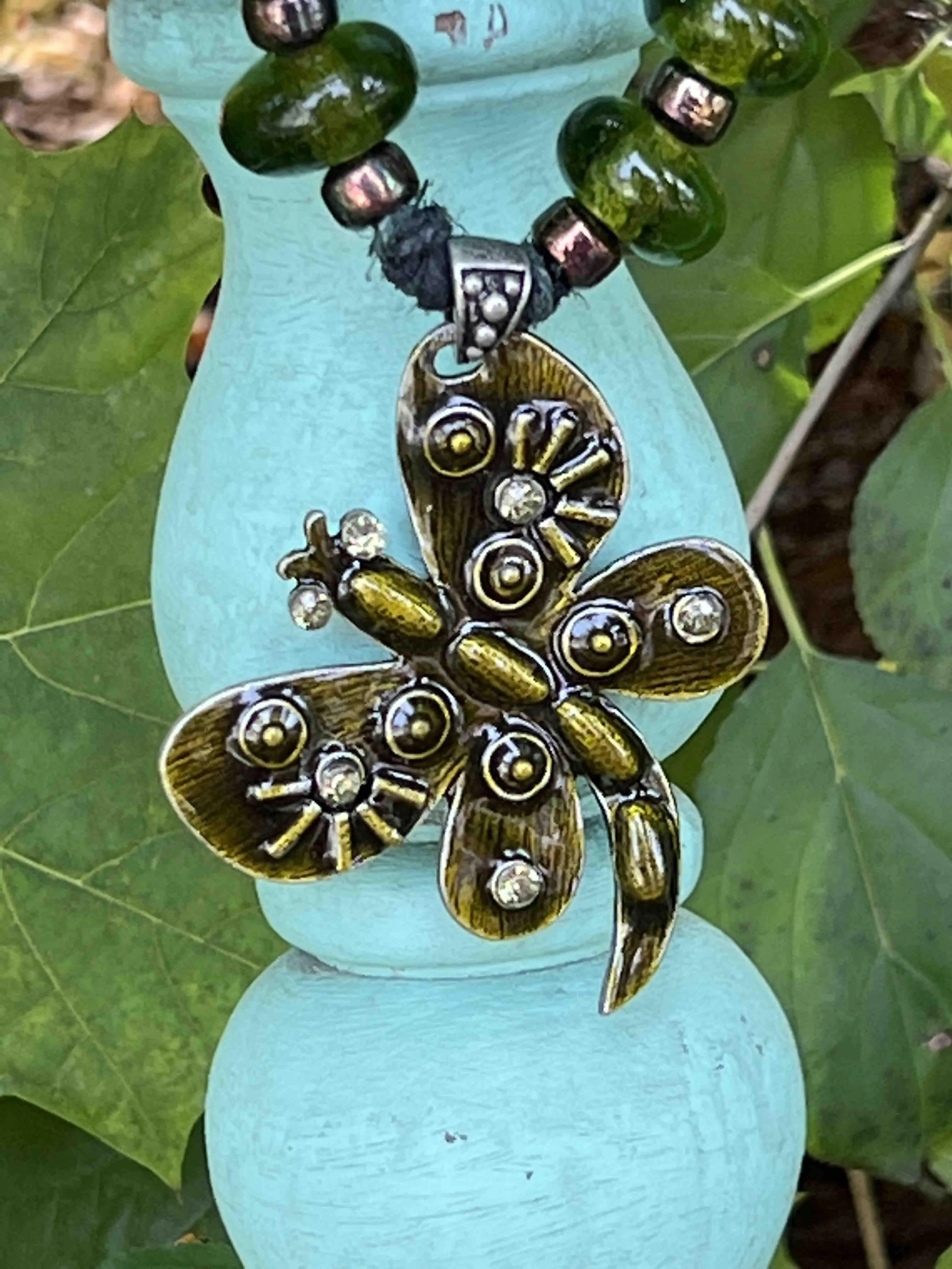 Product image for Dark Green Hemp Dragonfly Necklace by Christina Rietsch