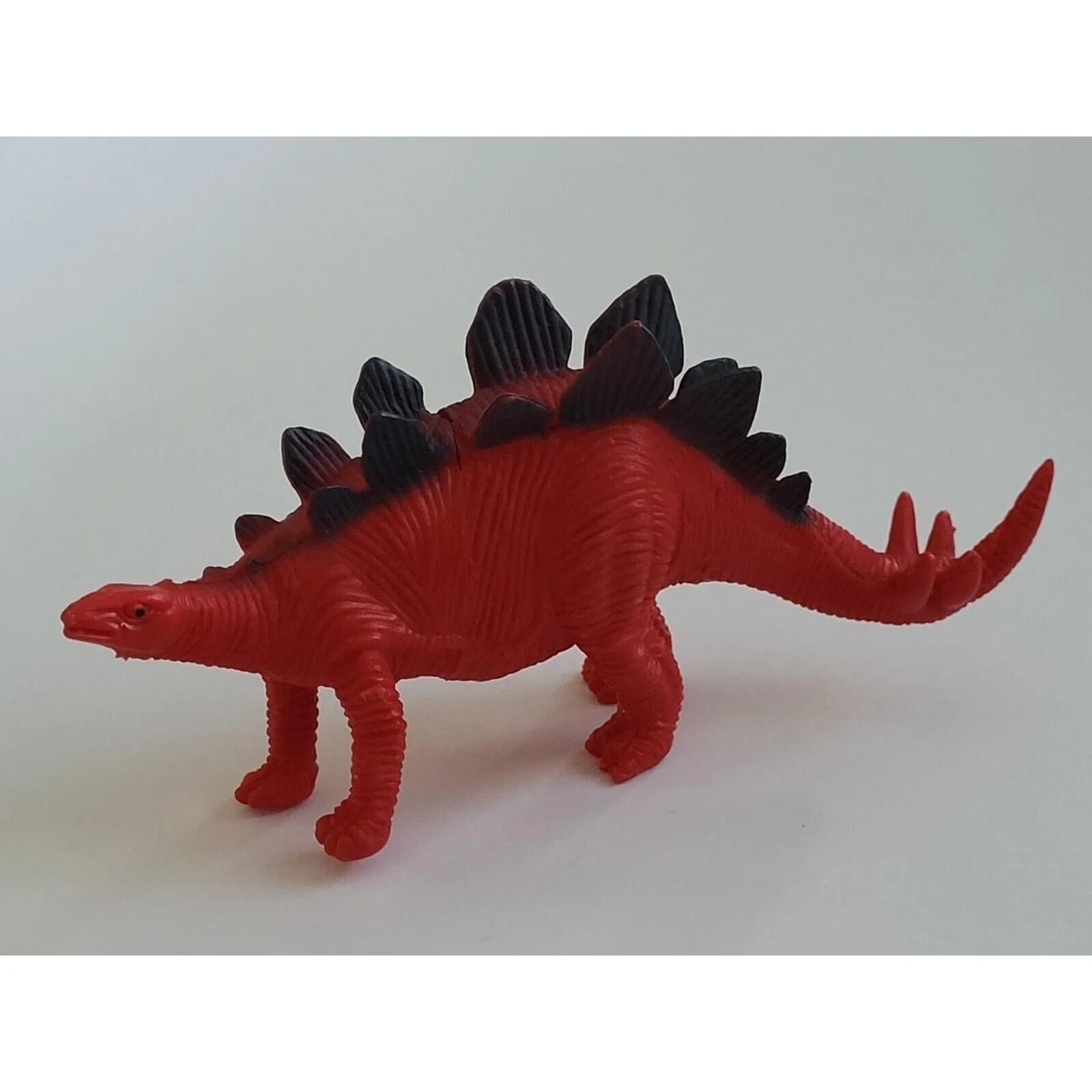 Product image for Rare Vintage 6" Stegosaurus Dinosaur Red/Black PVC Action Figure