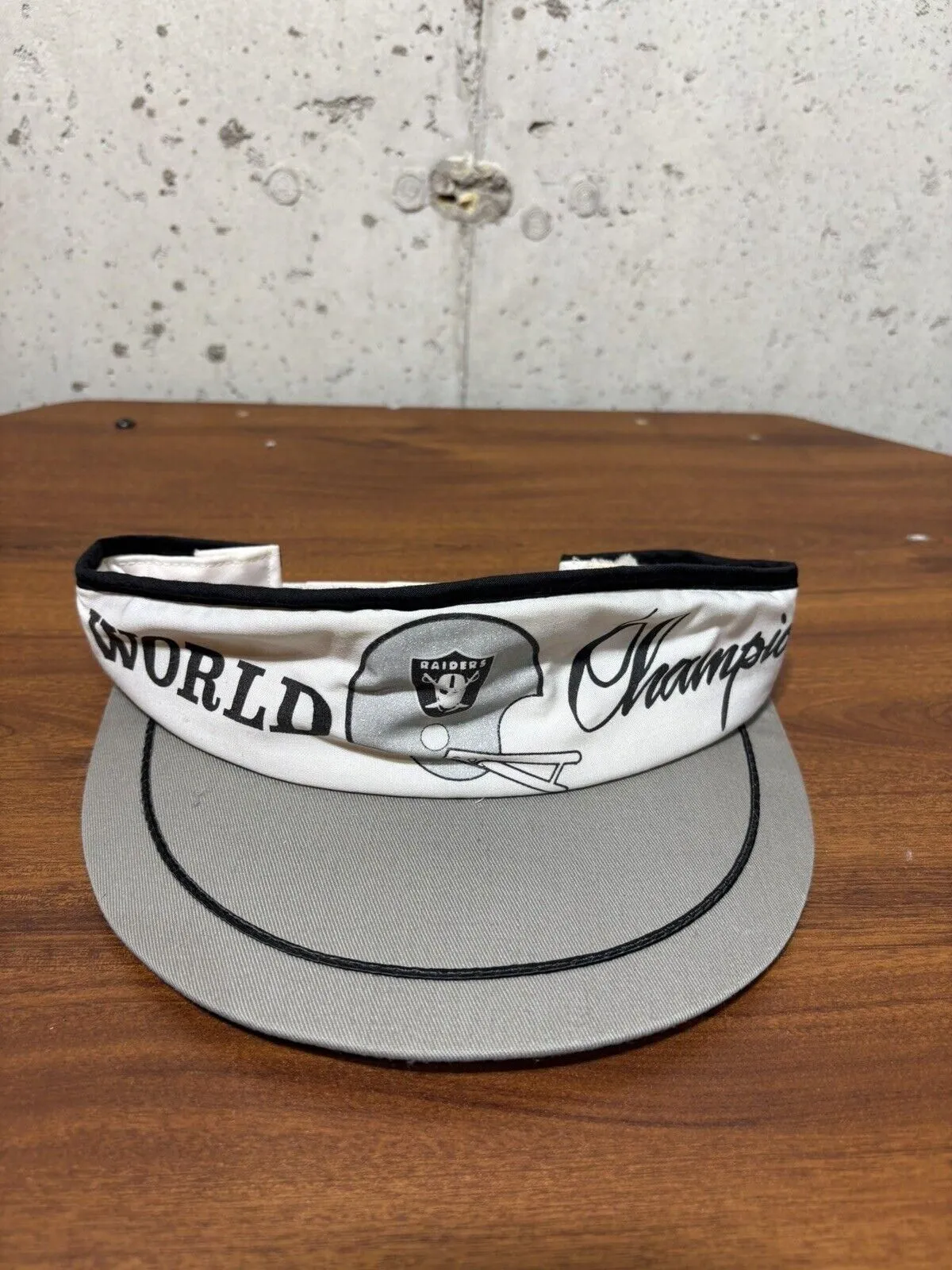 Product image for Vintage Oakland Raiders Visor World Champs SnapBack Adjustable NFL Football