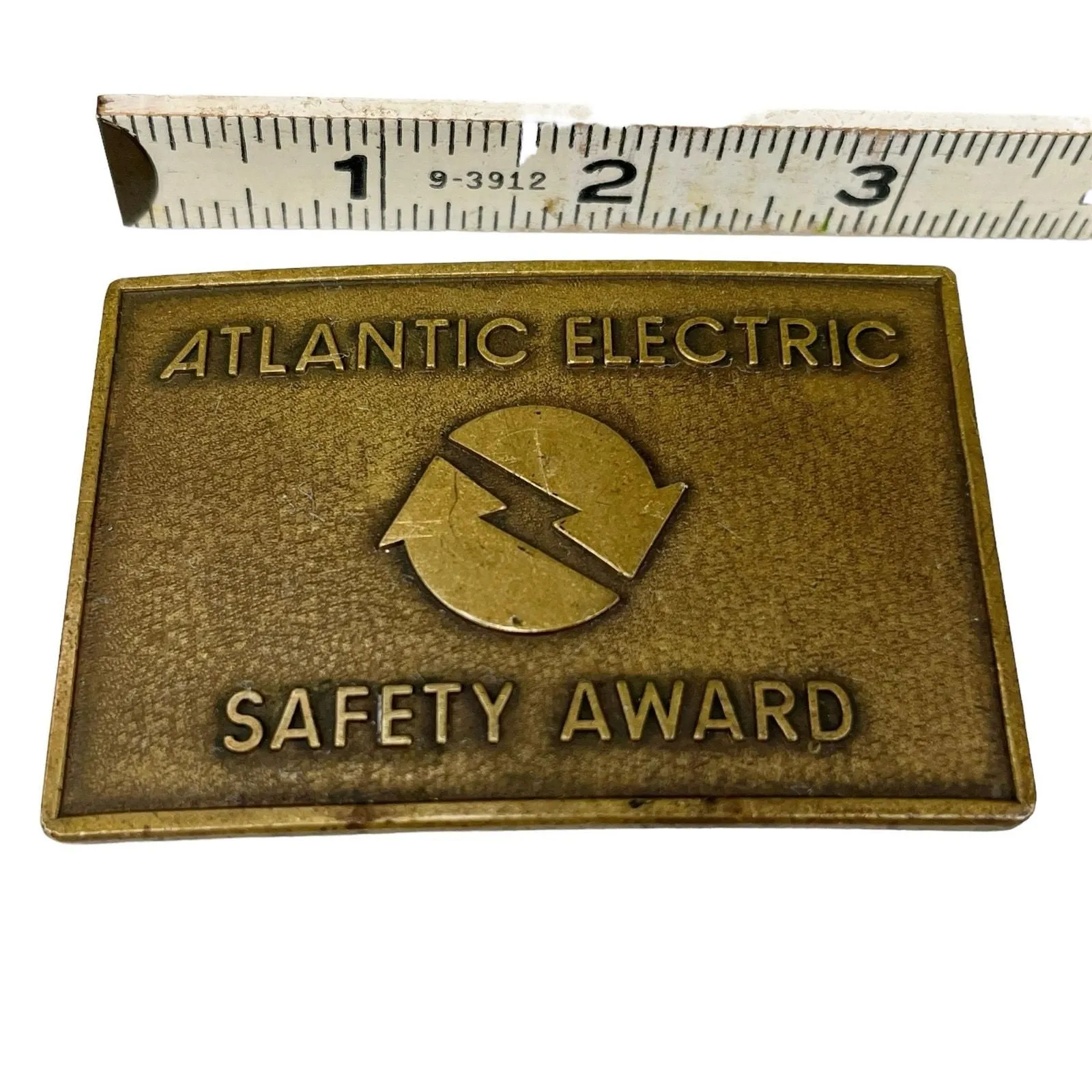 Product image for Vintage Atlantic Electric Safety Award Brass Belt Buckle 3" x 2"