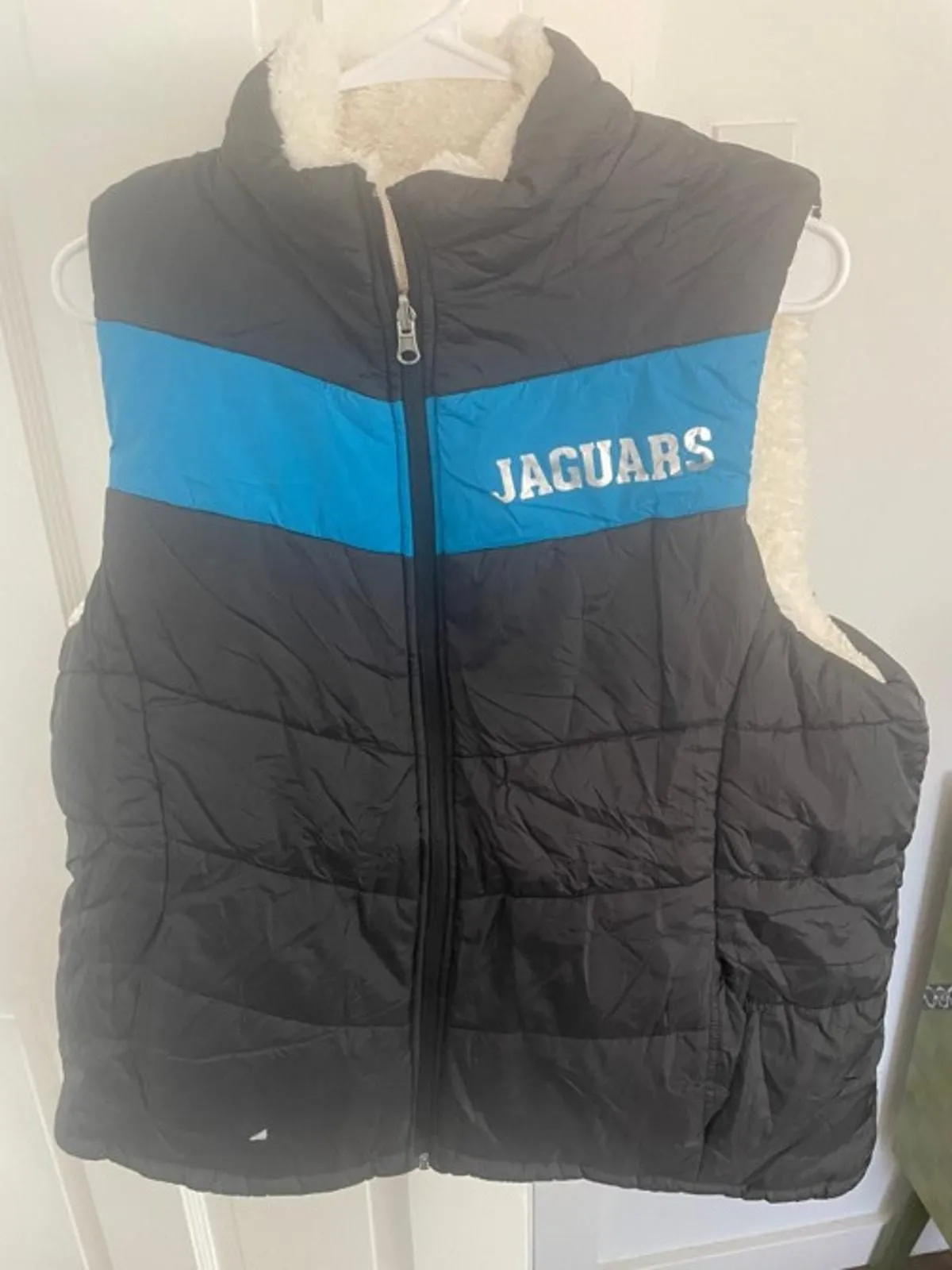 Product image for NWOT NFL Reversible Puffer Vest Sherpa - Jacksonville Jaguars Women's Small - new-without-tags - NFL
