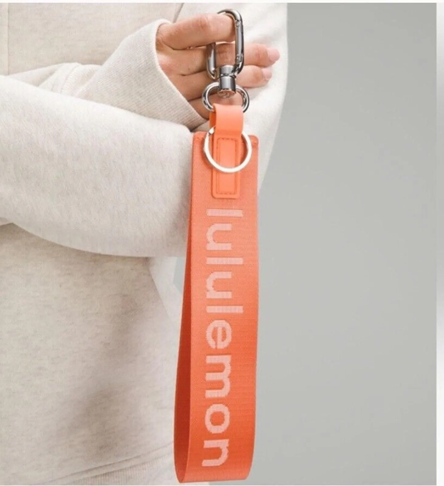 Product image for  Lululemon Never Lost Keychain Coral Whisper Retired New