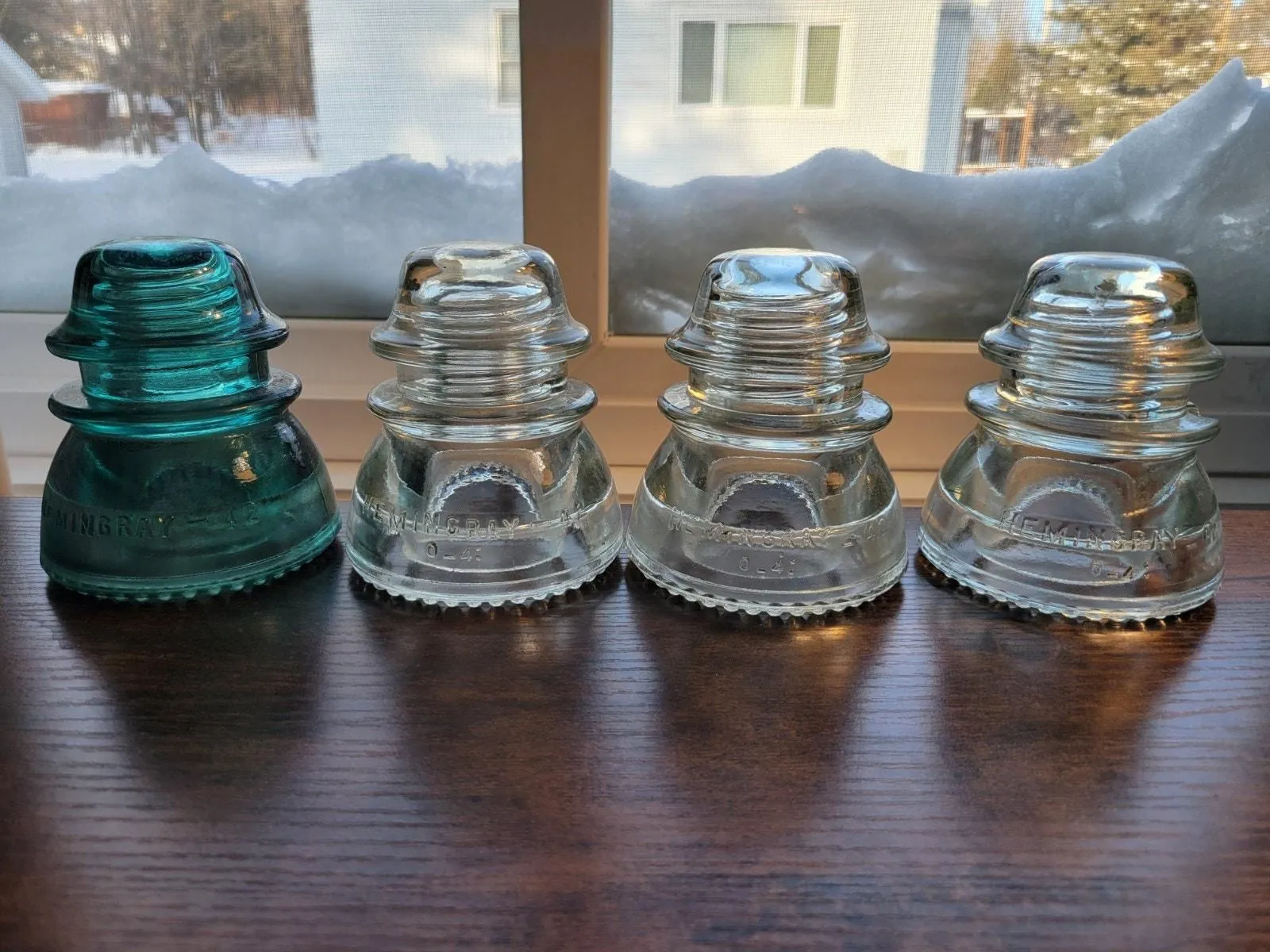 Product image for Lot of 4 Vintage Hemingray 42 Glass Insulators - 3-Clear, 1-Green - Made in USA