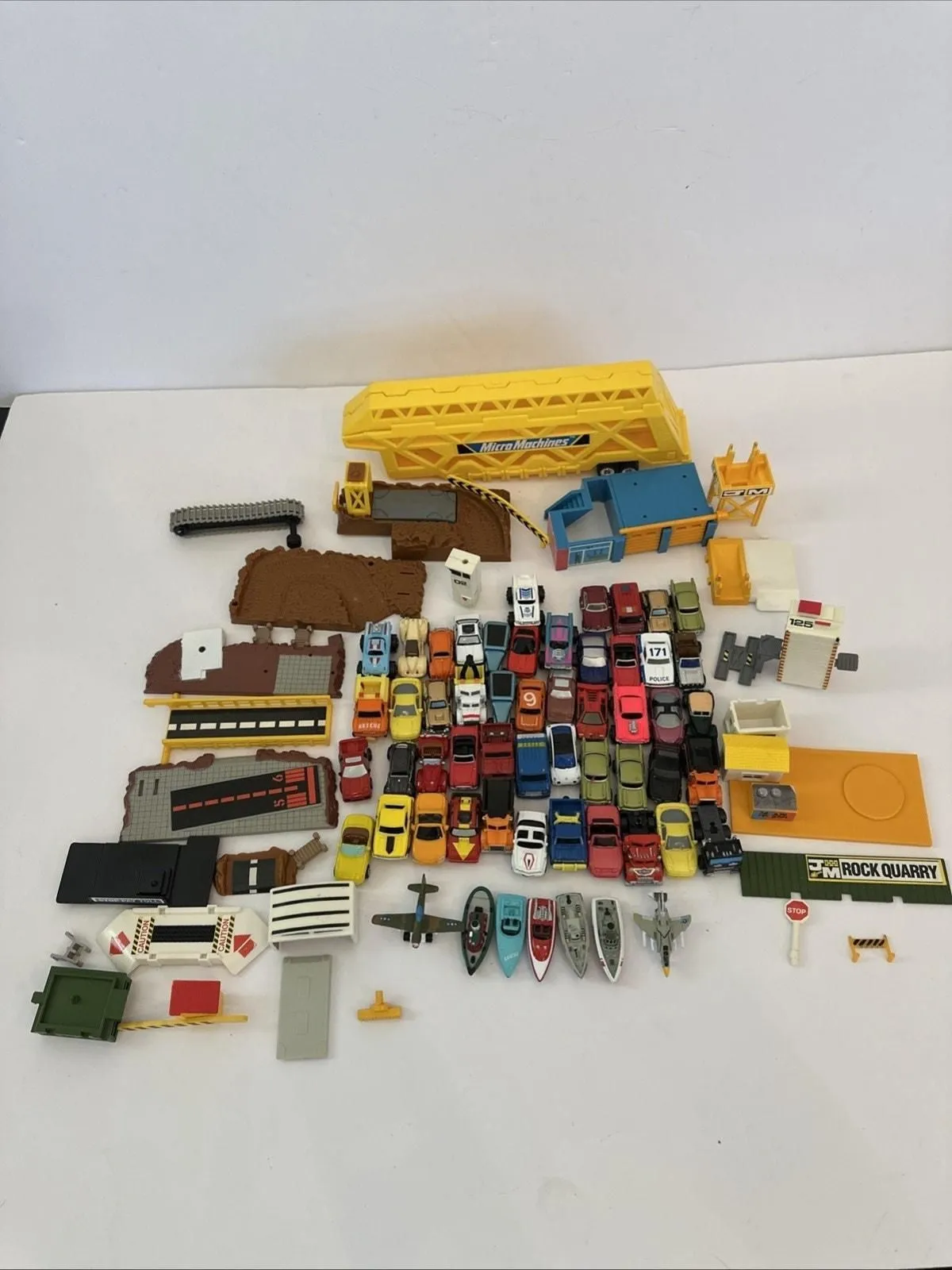 Product image for Micro Machines Lot Of 56 Vehicles 1980s 1990s Cars Trucks Boats Planes Assorted