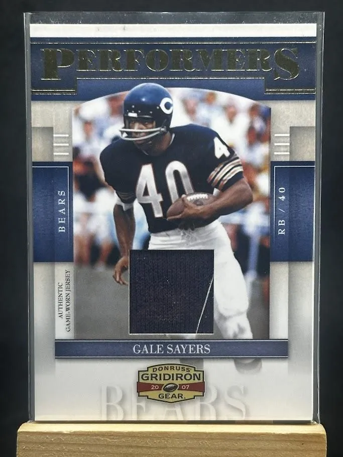 Product image for Gale Sayers 2007 Donruss Playoff Gridiron Performers Game Used Jersey #P-18 - 2007 - Football - P-18 - National Football League (NFL) - 2007 Donruss - Gale Sayers - Playoff Gridiron Performers Game Used Jersey - Chicago Bears