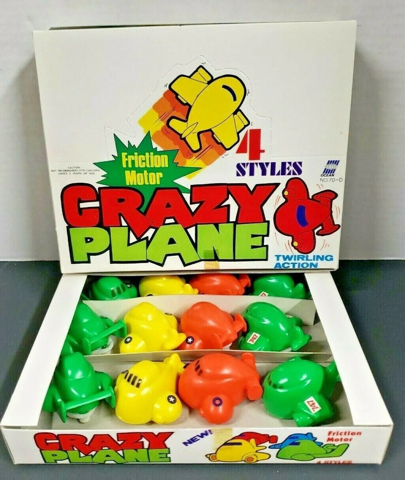 Product image for 12 Friction Motor Crazy Plane Display Old Store Stock 