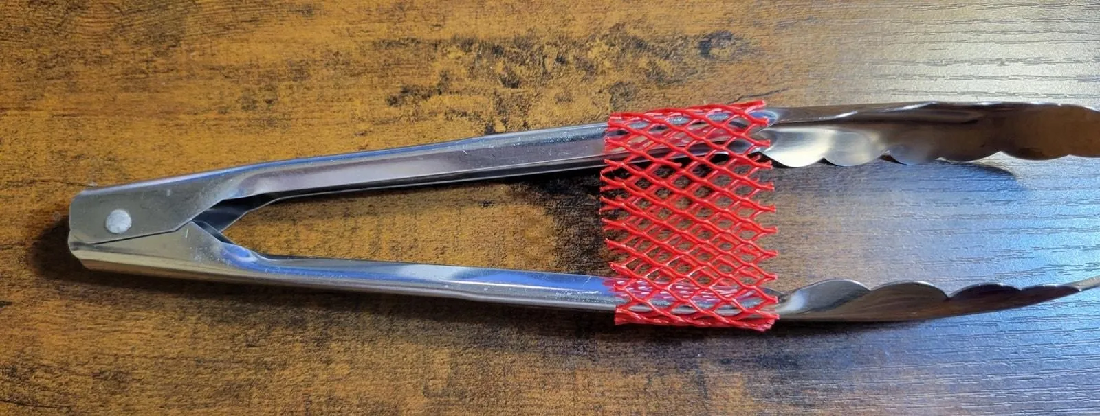 Product image for Silver Polar Stainless Steel Tongs - 9" Long (used) - Korea - pre-owned---good